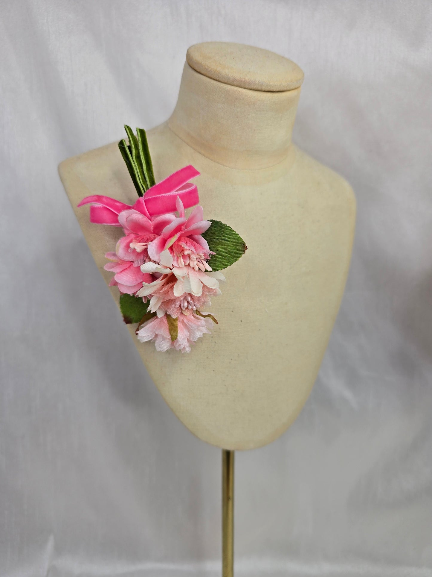 Small pale pink blossom corsage
