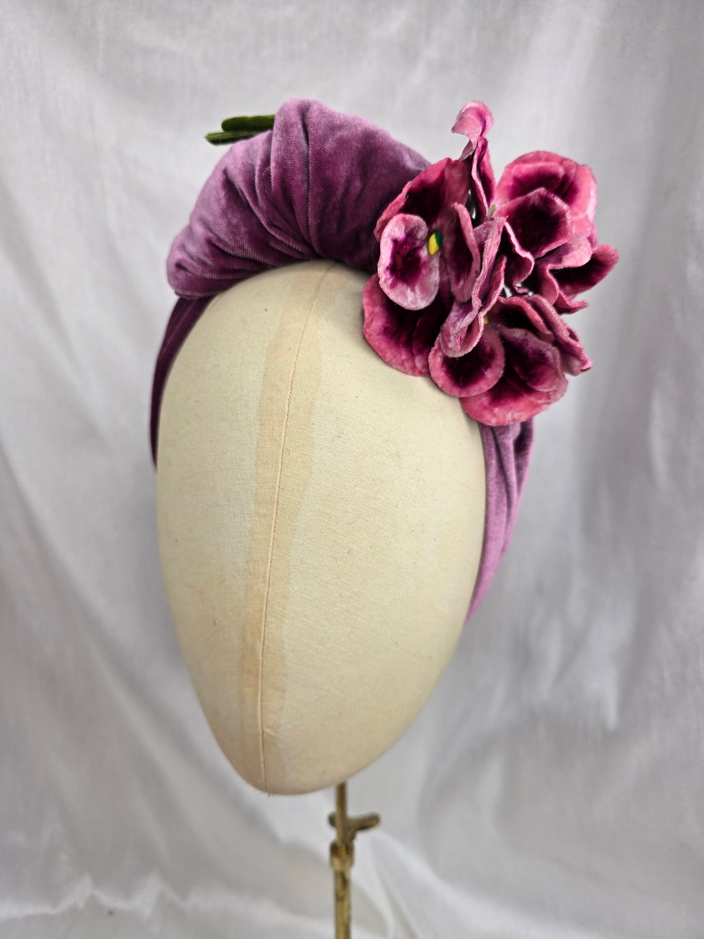 Heather purple stretch velvet turban with flower trim and corsage