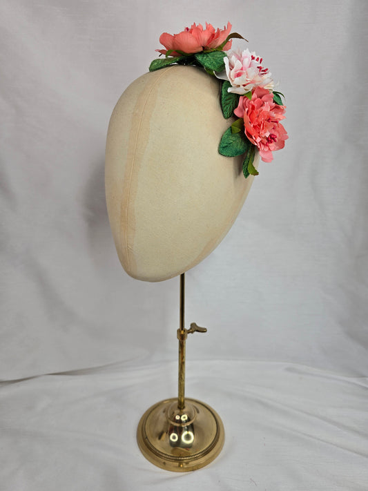 Coral and green rose hair flower