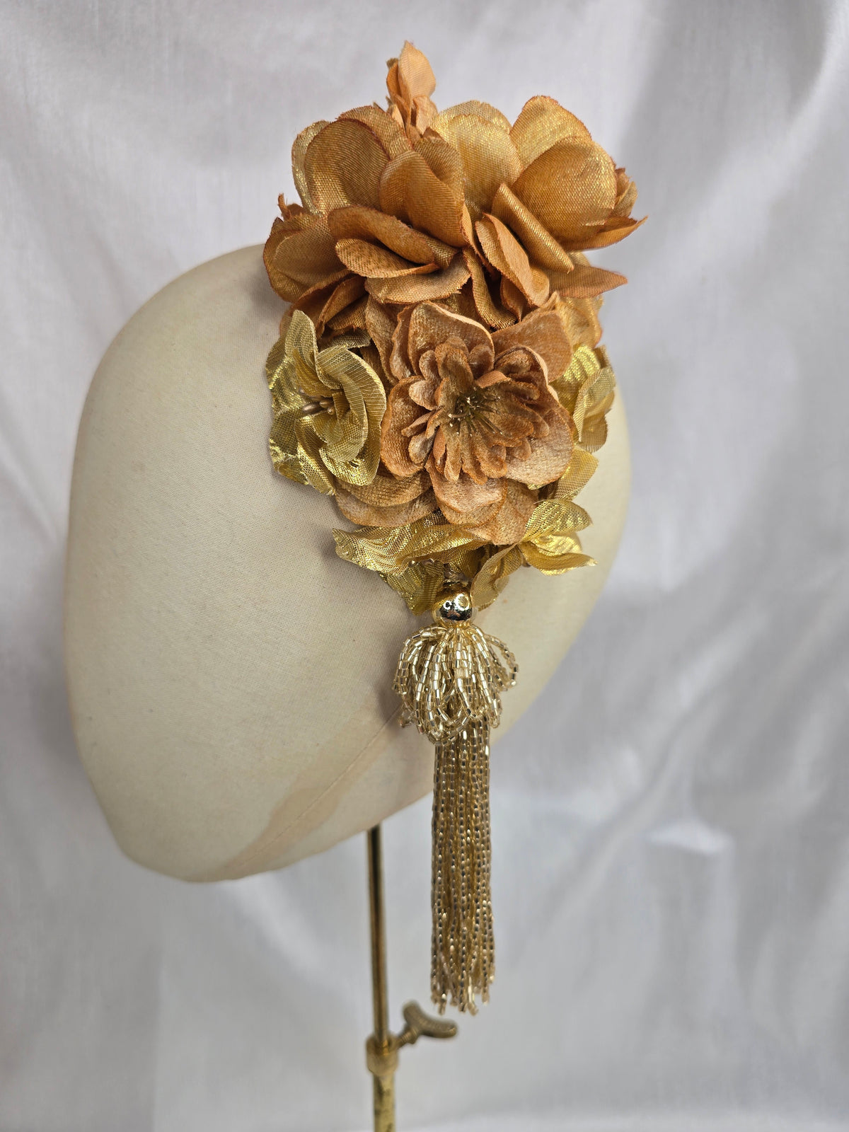Medium autumn gold flower headpiece/corsage with beaded tassel