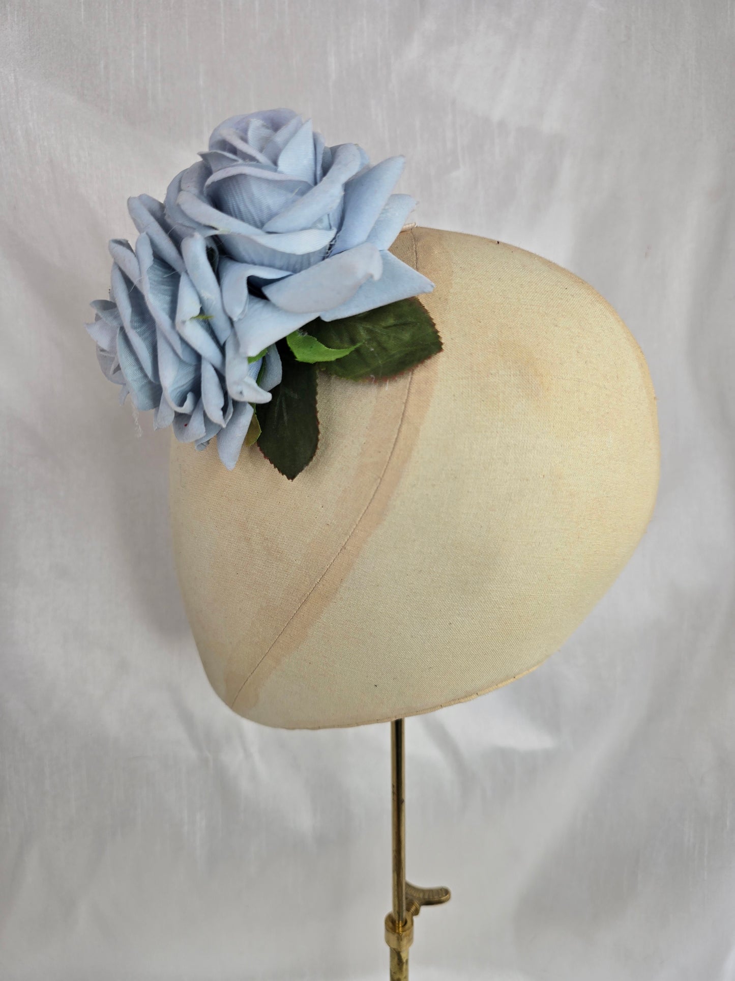 Pale blue rose hair flower