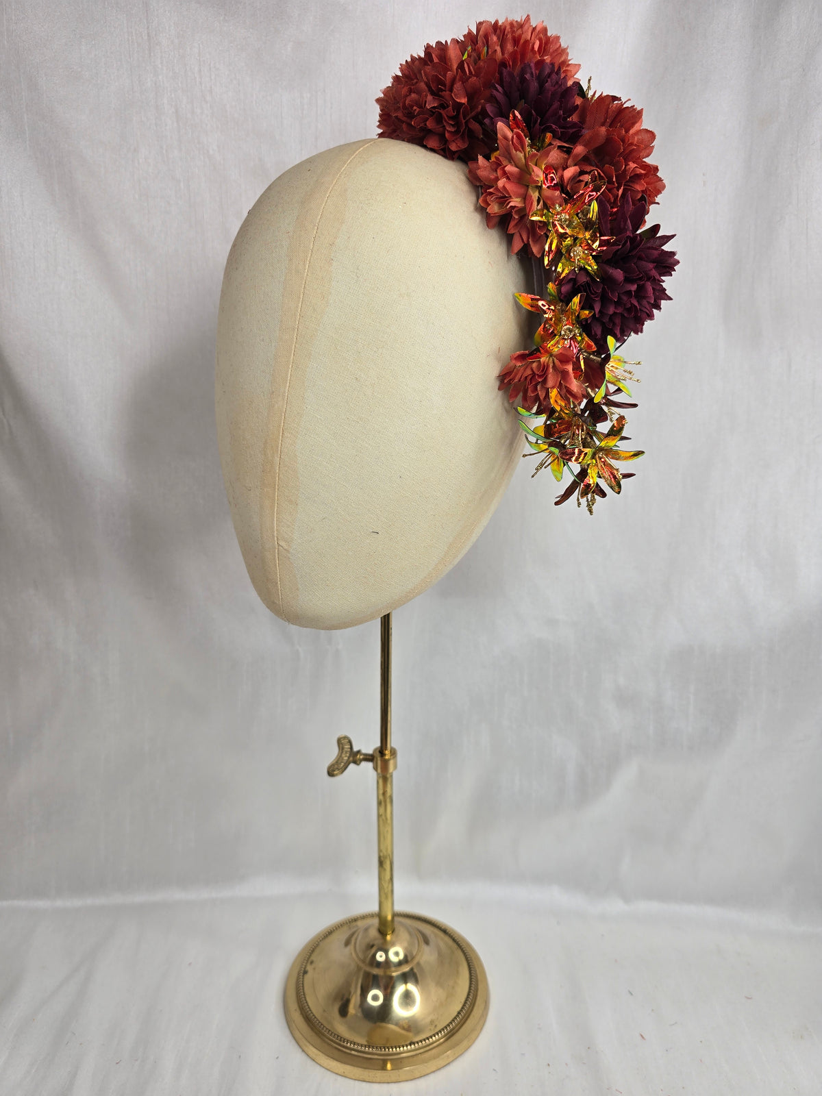 Large orange, maroon and iridescent orange large hair flower