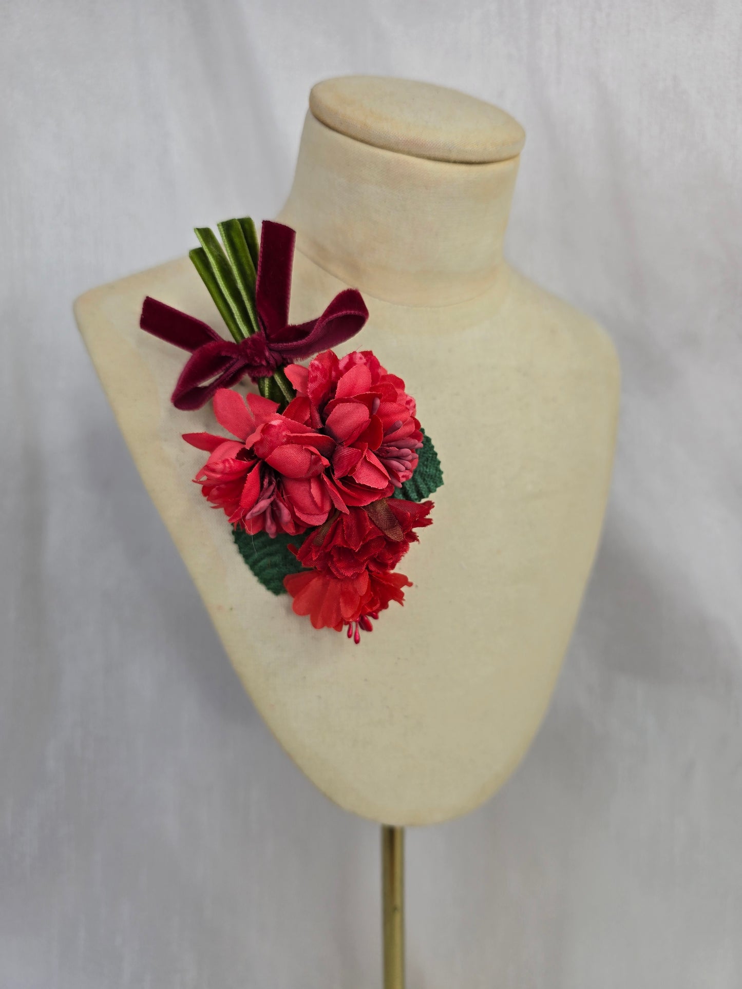Small red blossom corsage