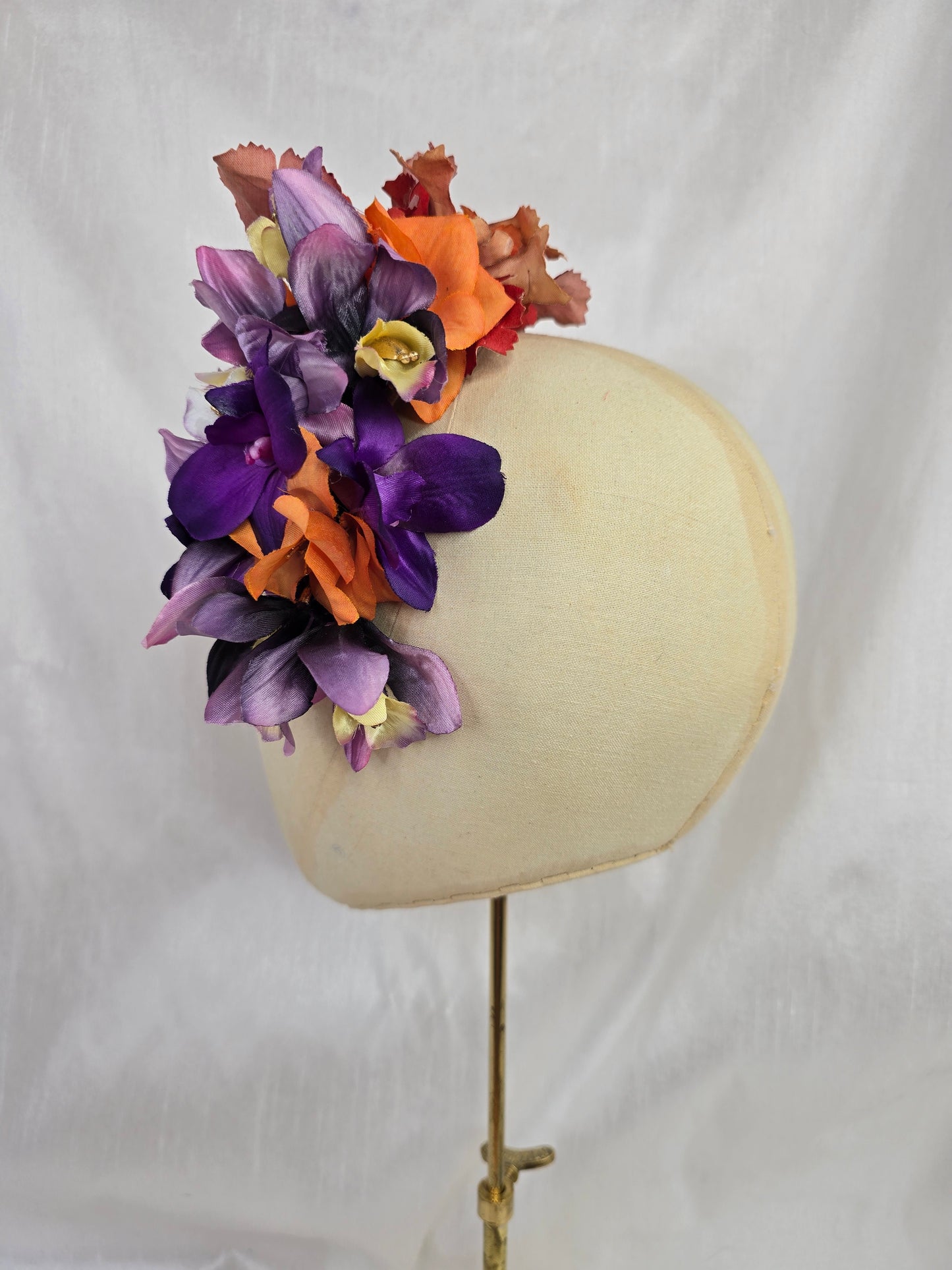 Large orange and purple orchid hair flower