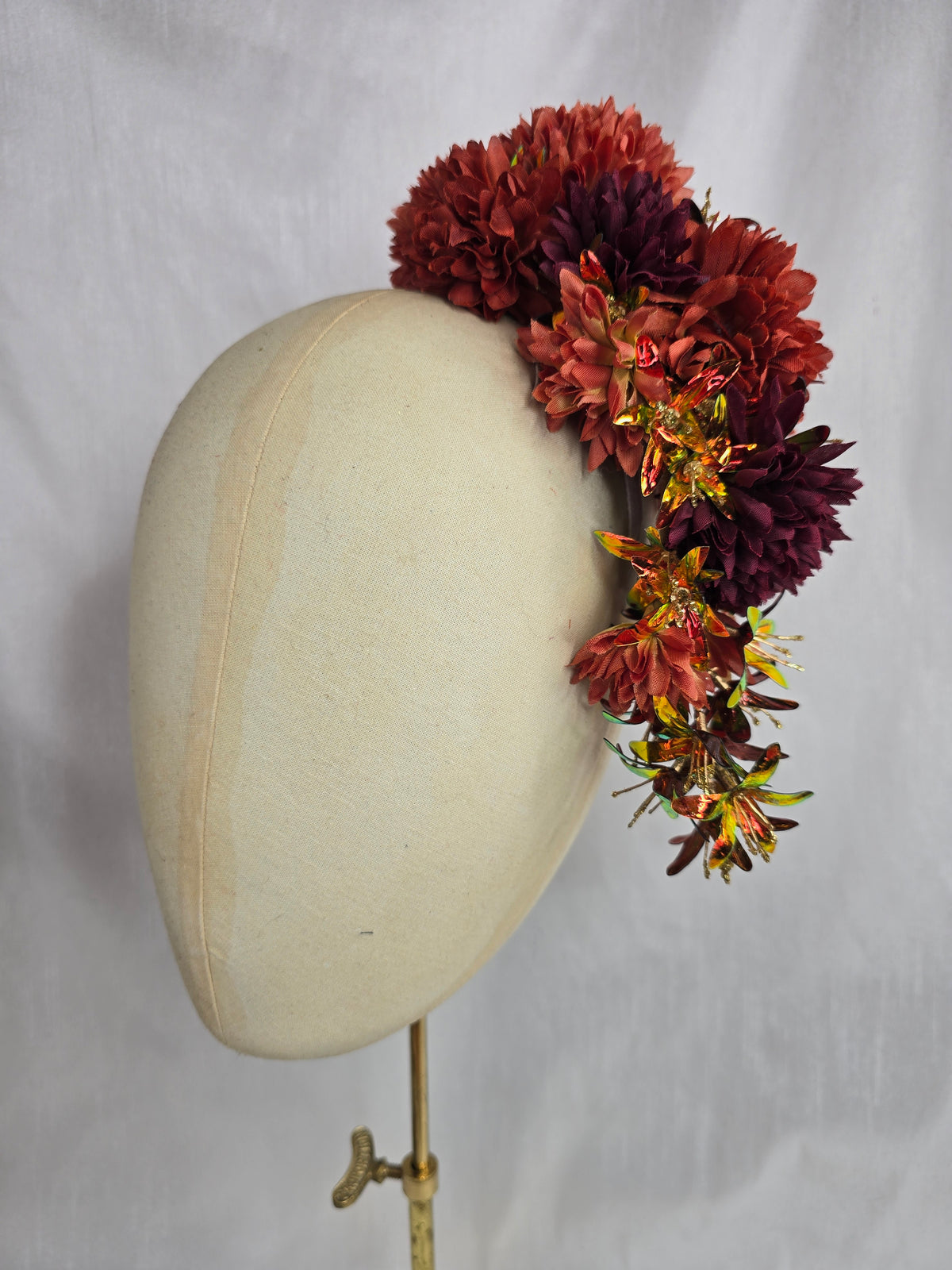 Large orange, maroon and iridescent orange large hair flower