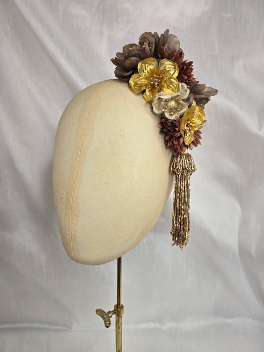 Brown and gold medium headpiece with gold beaded tassel