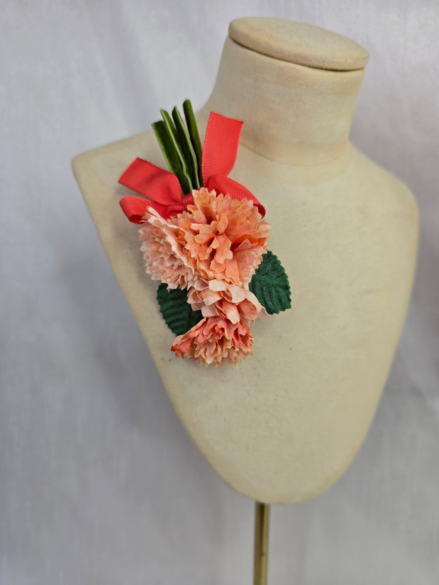 Small peach blossom corsage