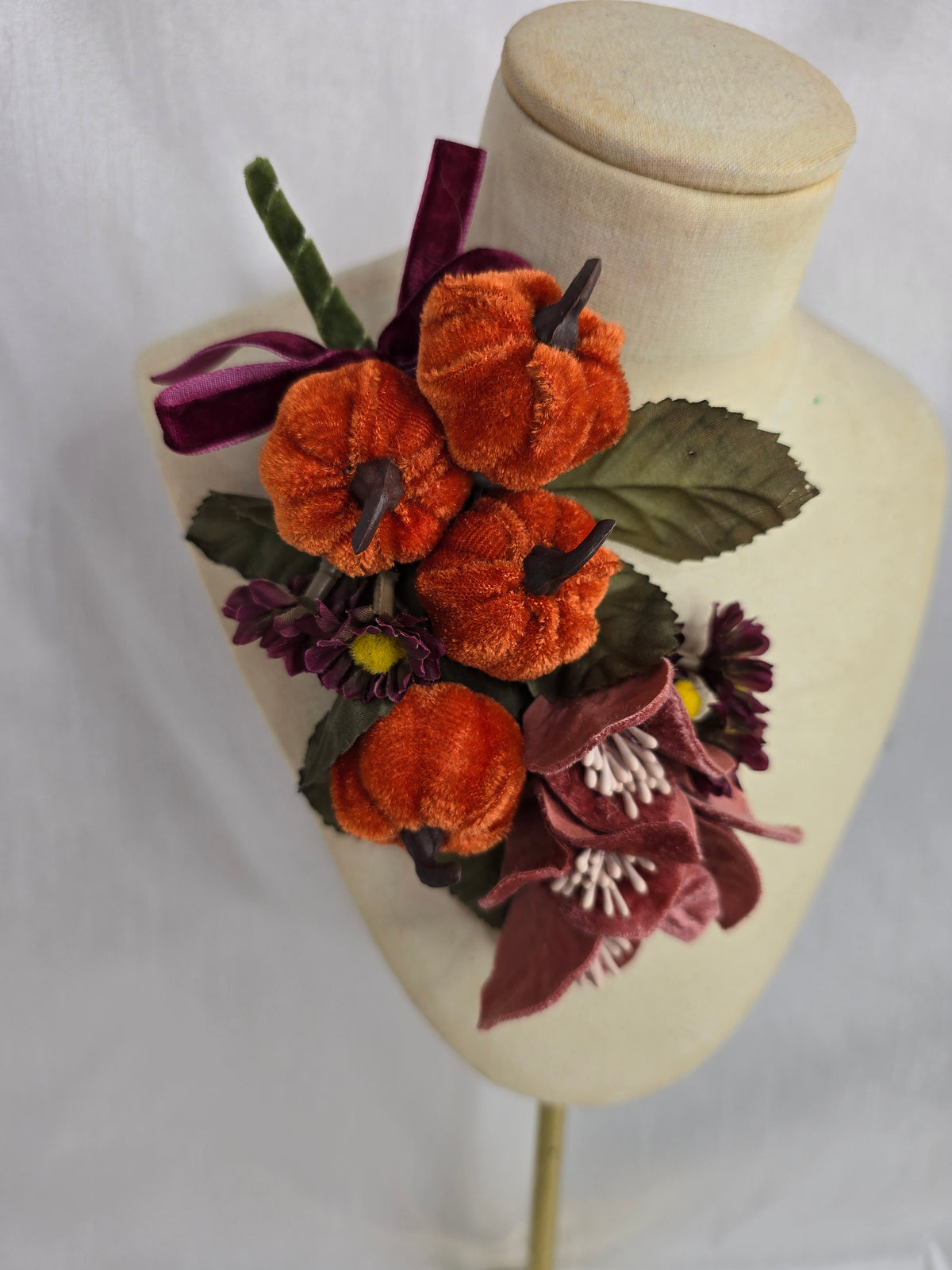 Orange, pink and teal pumpkin corsage