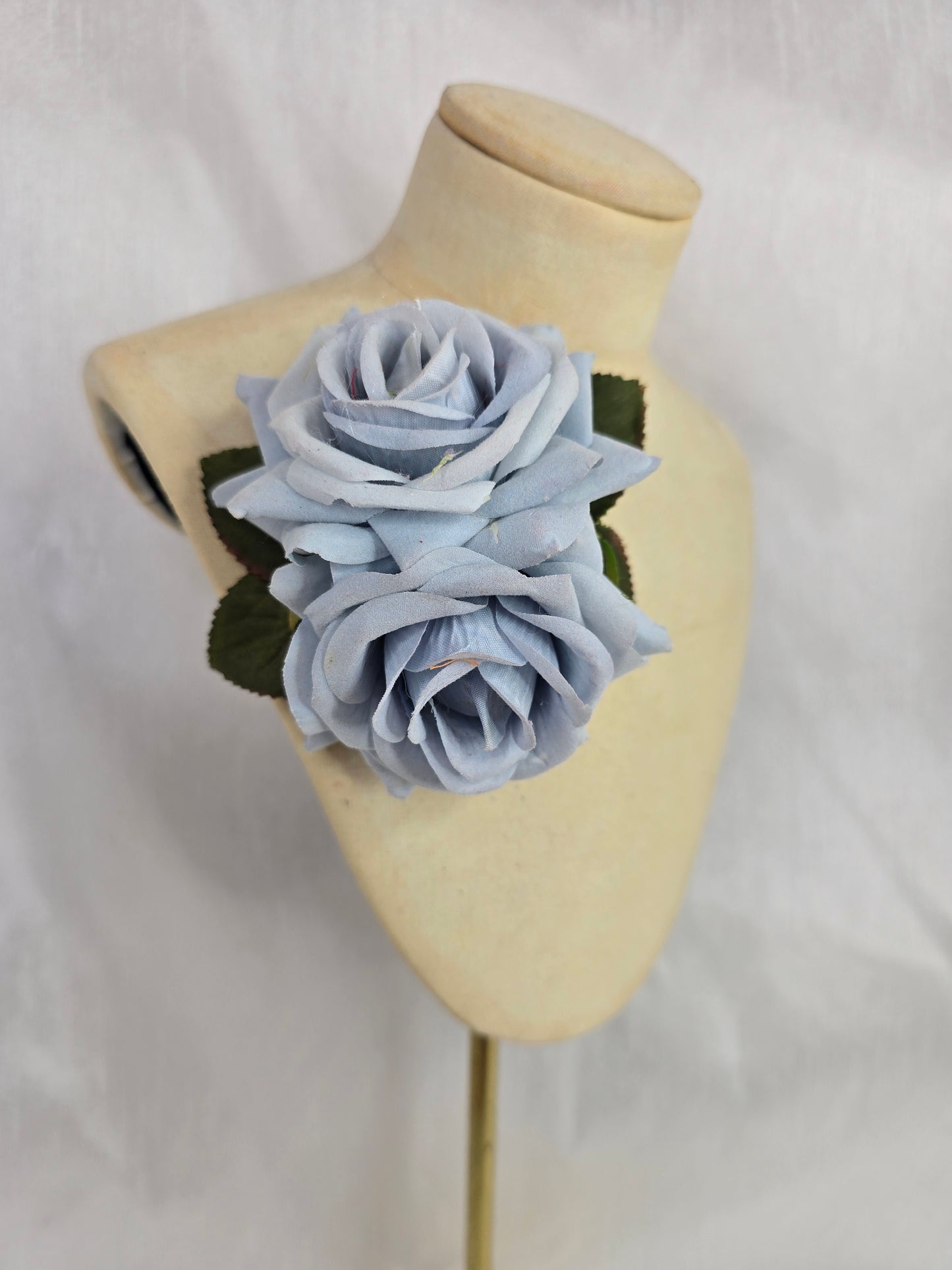 Pale blue rose hair flower