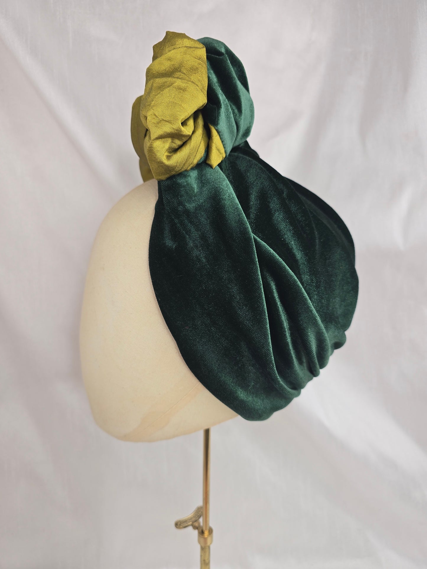 Green two tone turban with corsage