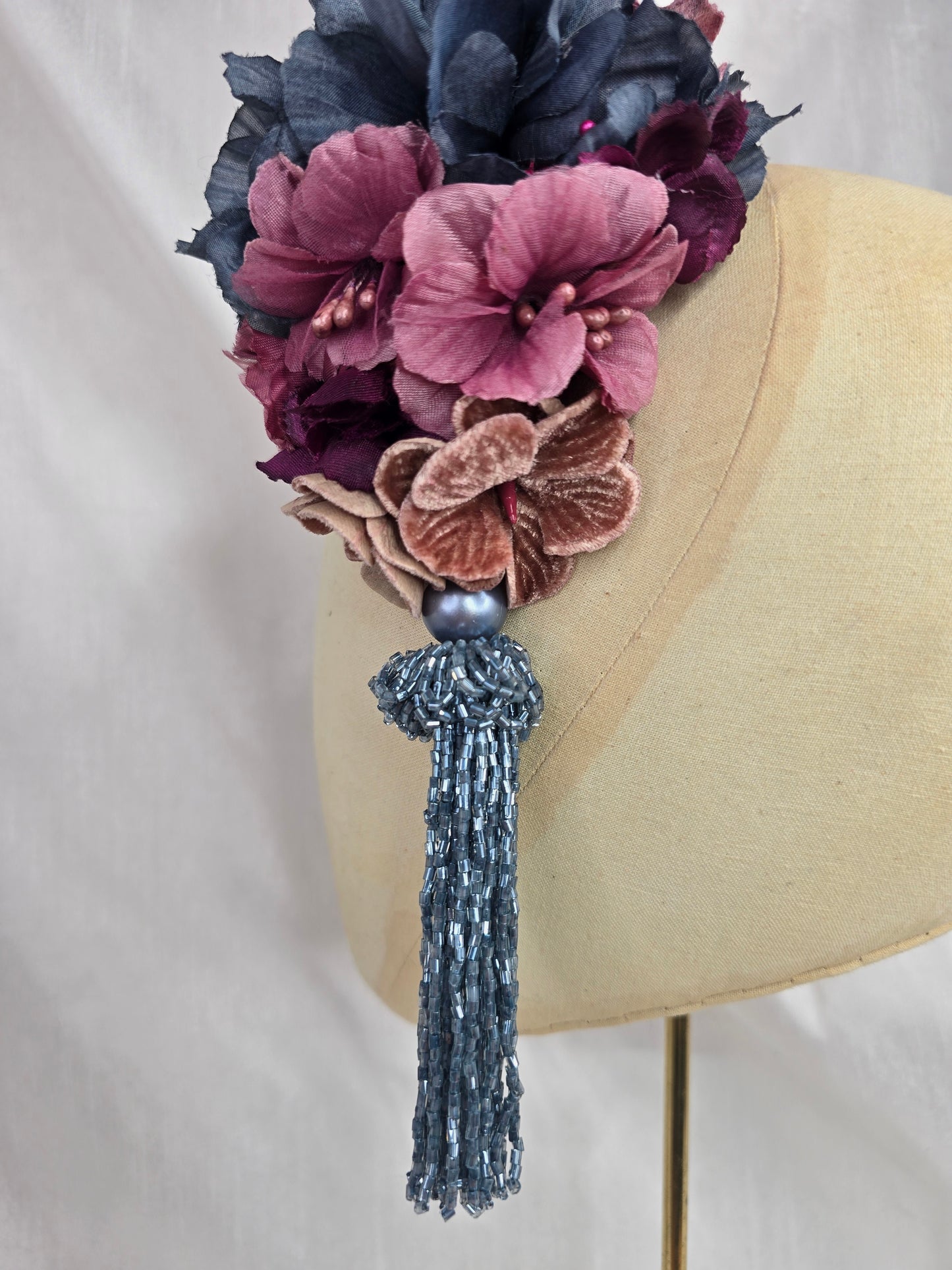 Medium purple and blue flower headpiece with beaded tassel
