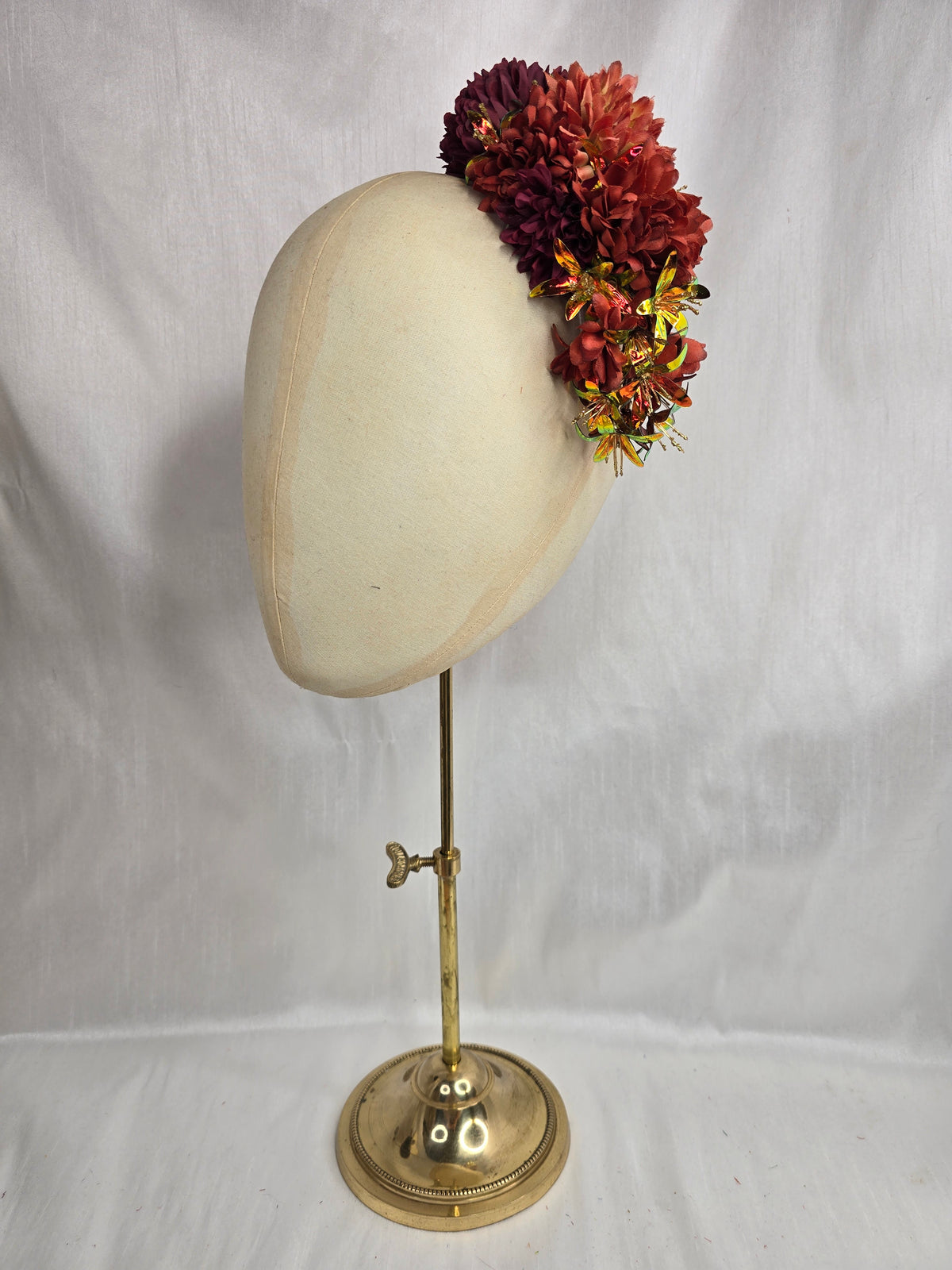 Medium orange, maroon and iridescent orange hair flower