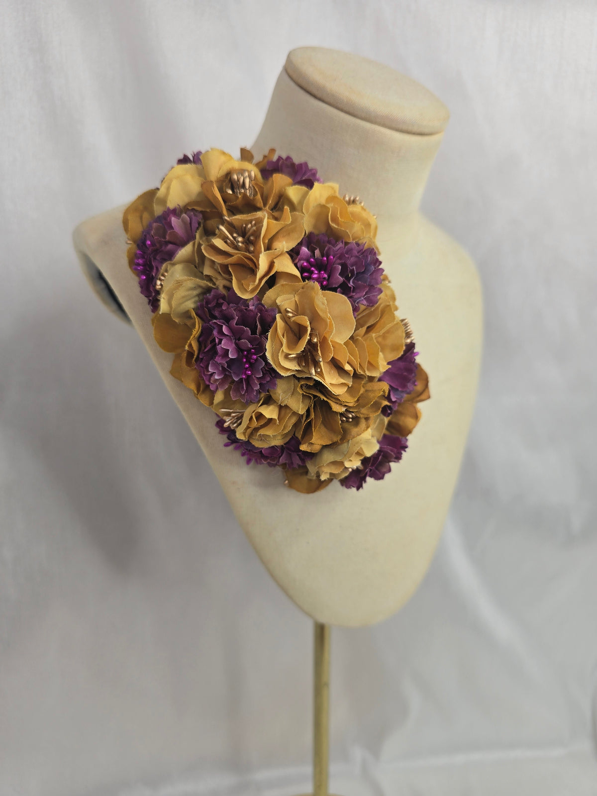Purple and mustard blossom hair flower/corsage