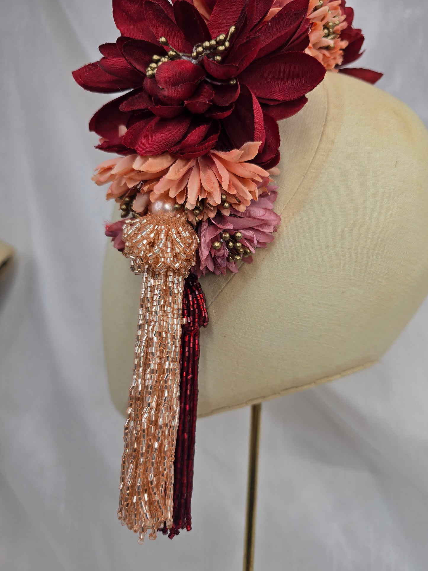 Large red, coral, pink and gold flower headpiece with beaded tassels