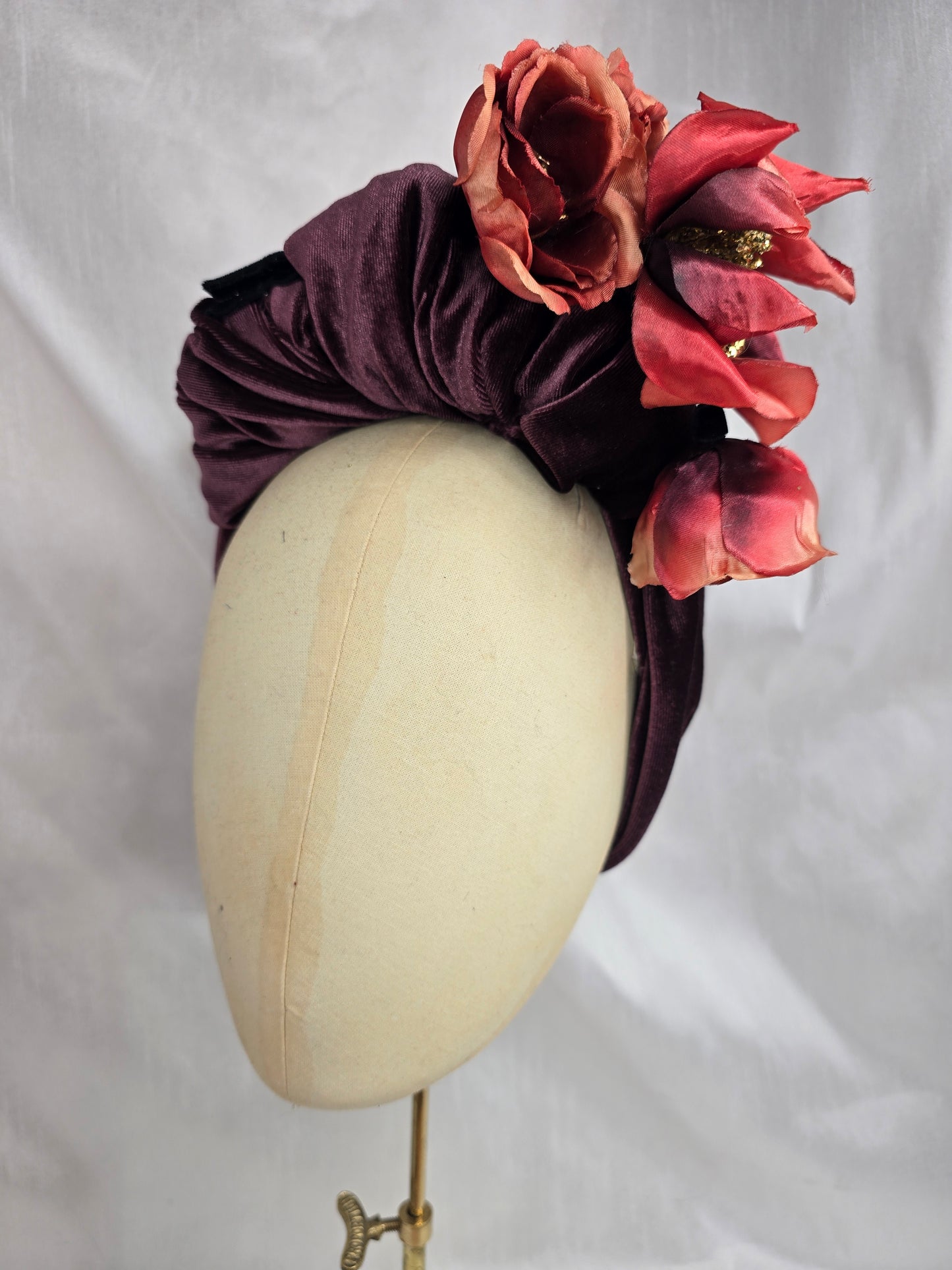 Plum brown stretch velvet turban with flower trim and corsage