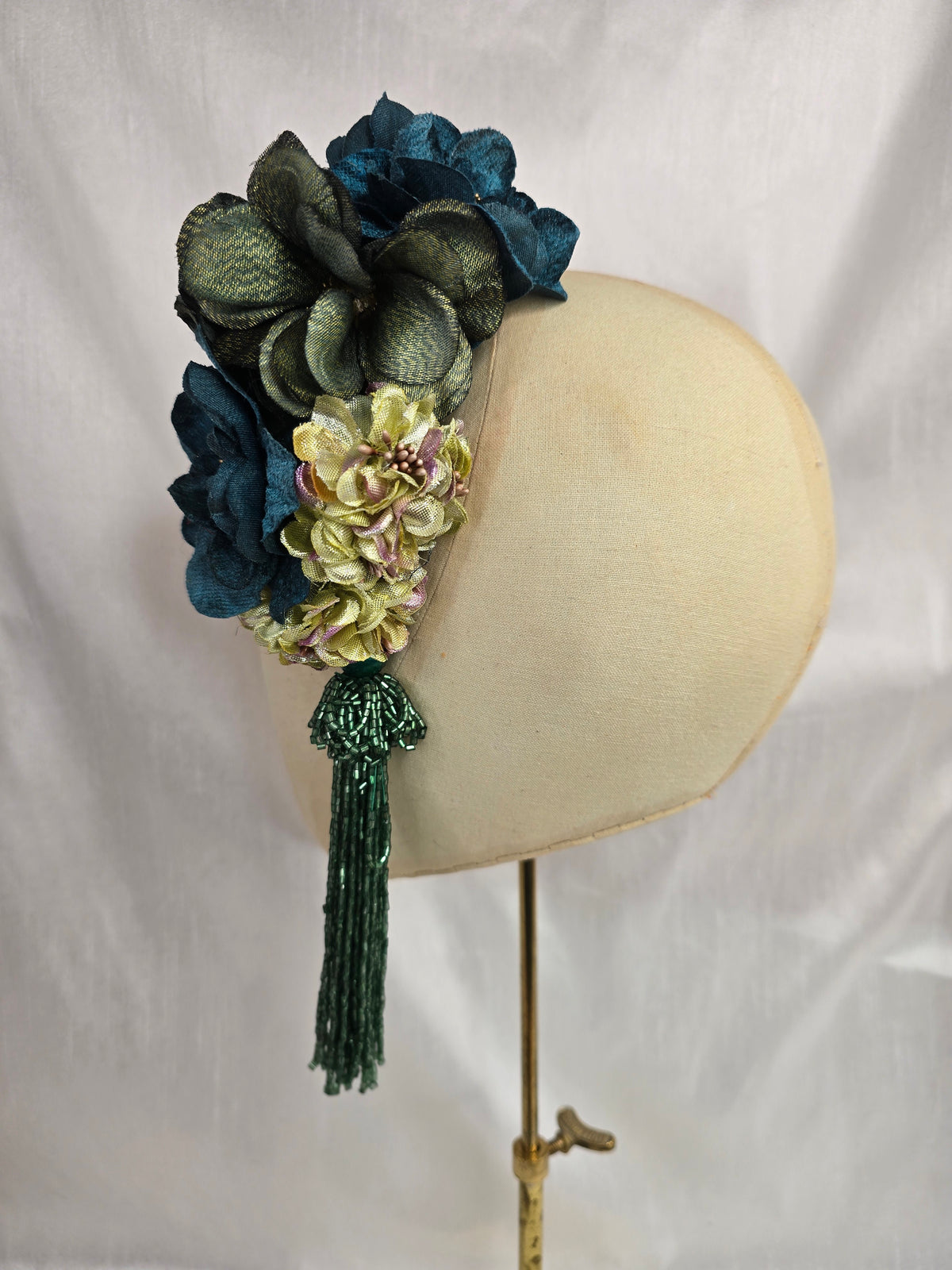 Medium teal, green, gold and chartreuse flower headpiece/corsage with beaded tassel