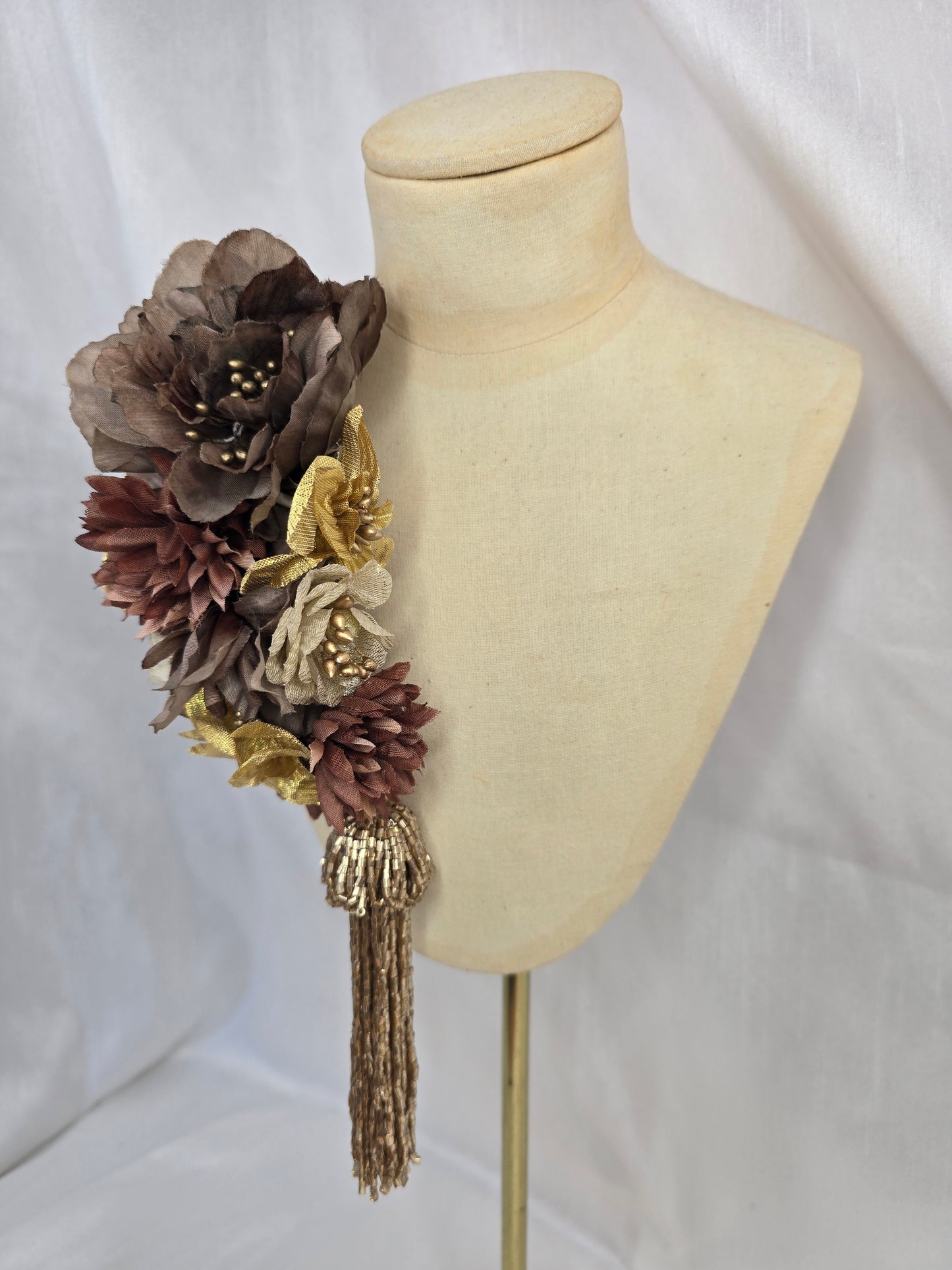 Brown and gold medium headpiece with gold beaded tassel