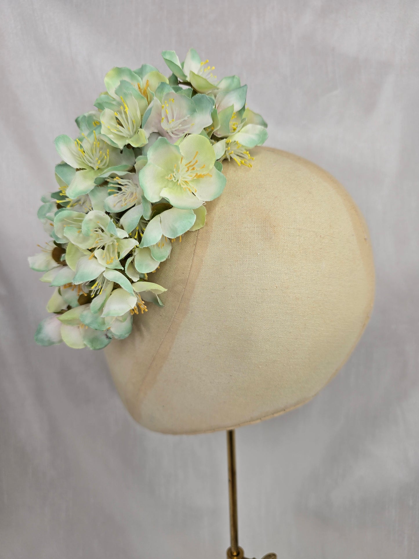 Large pale green cherry blossom hair flower