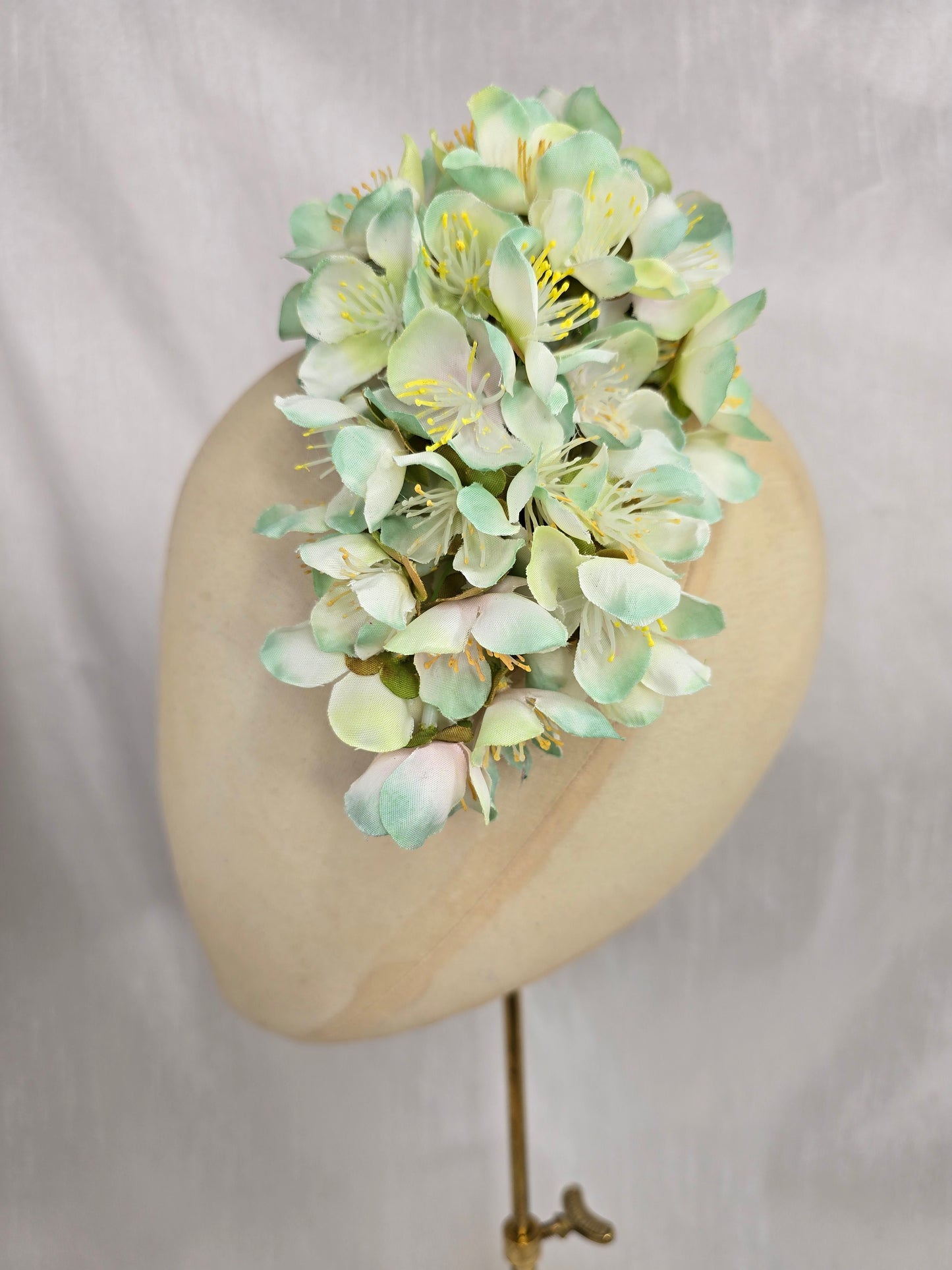 Large pale green cherry blossom hair flower