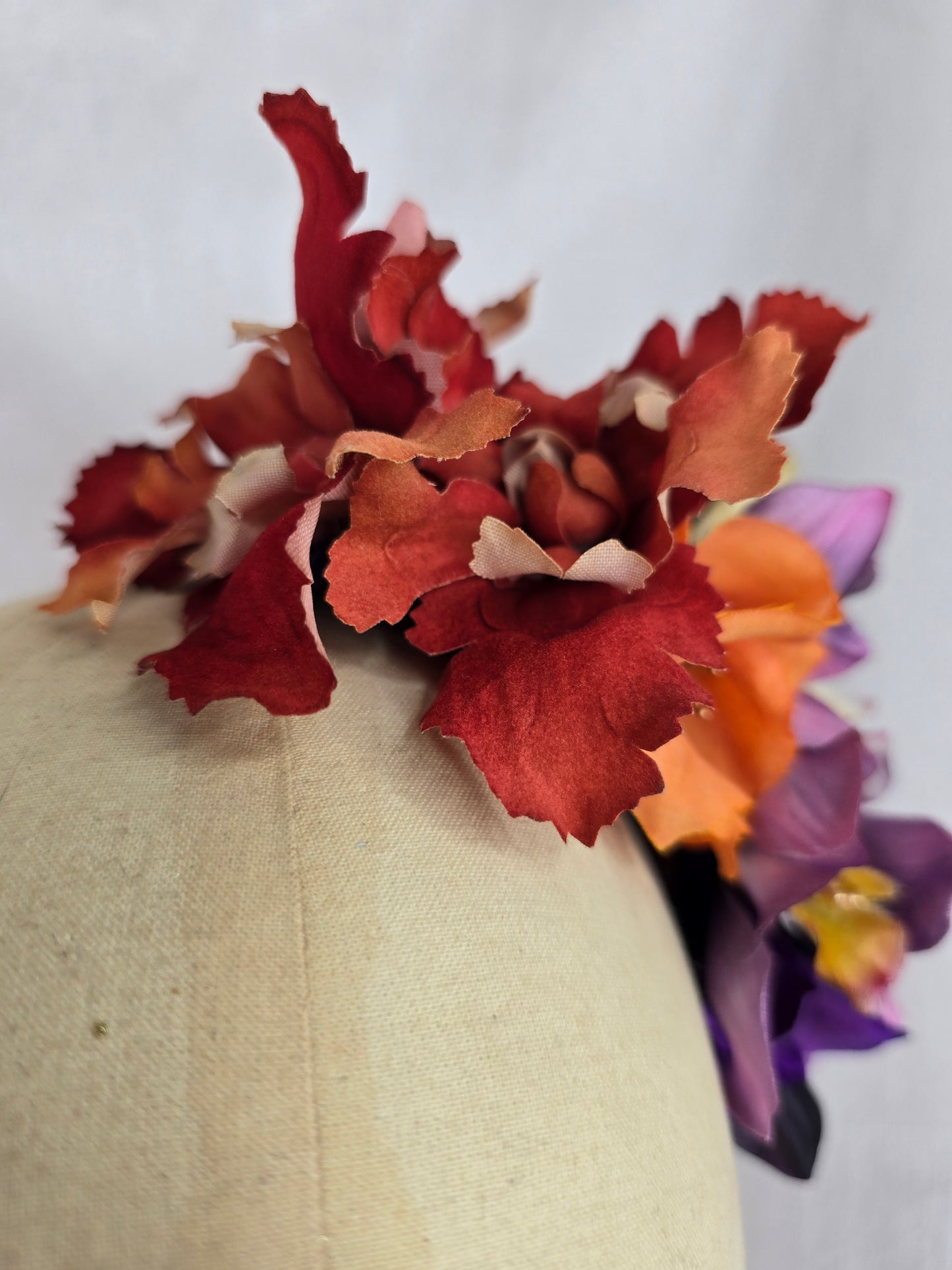 Large orange and purple orchid hair flower