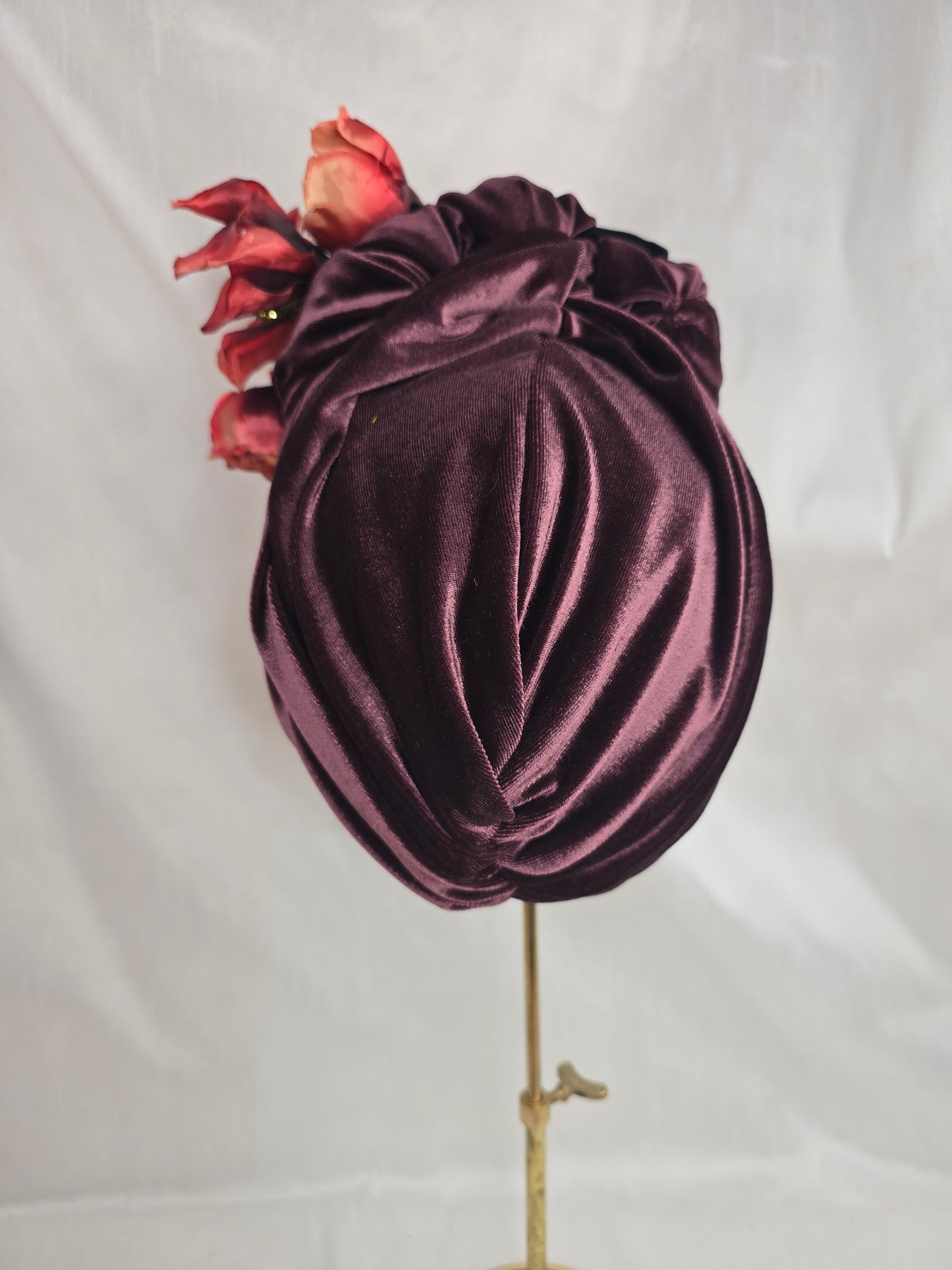 Plum brown stretch velvet turban with flower trim and corsage