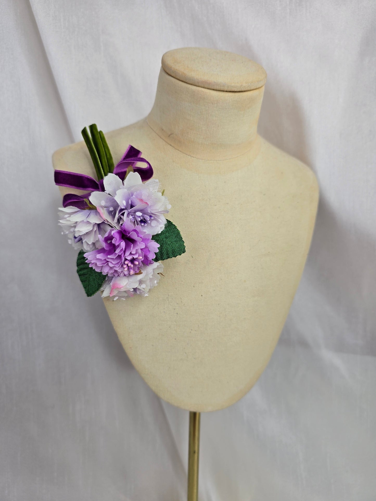 Small lilac blossom corsage