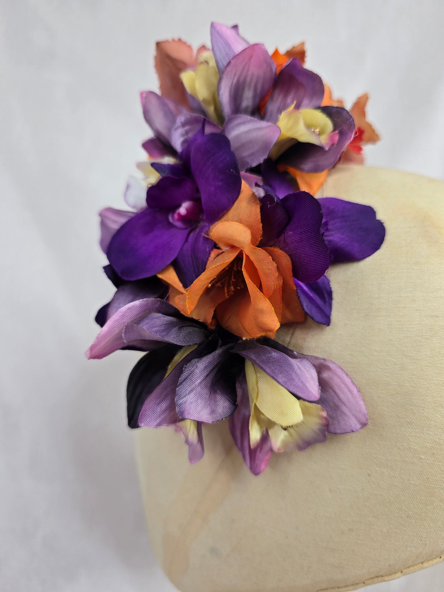 Large orange and purple orchid hair flower