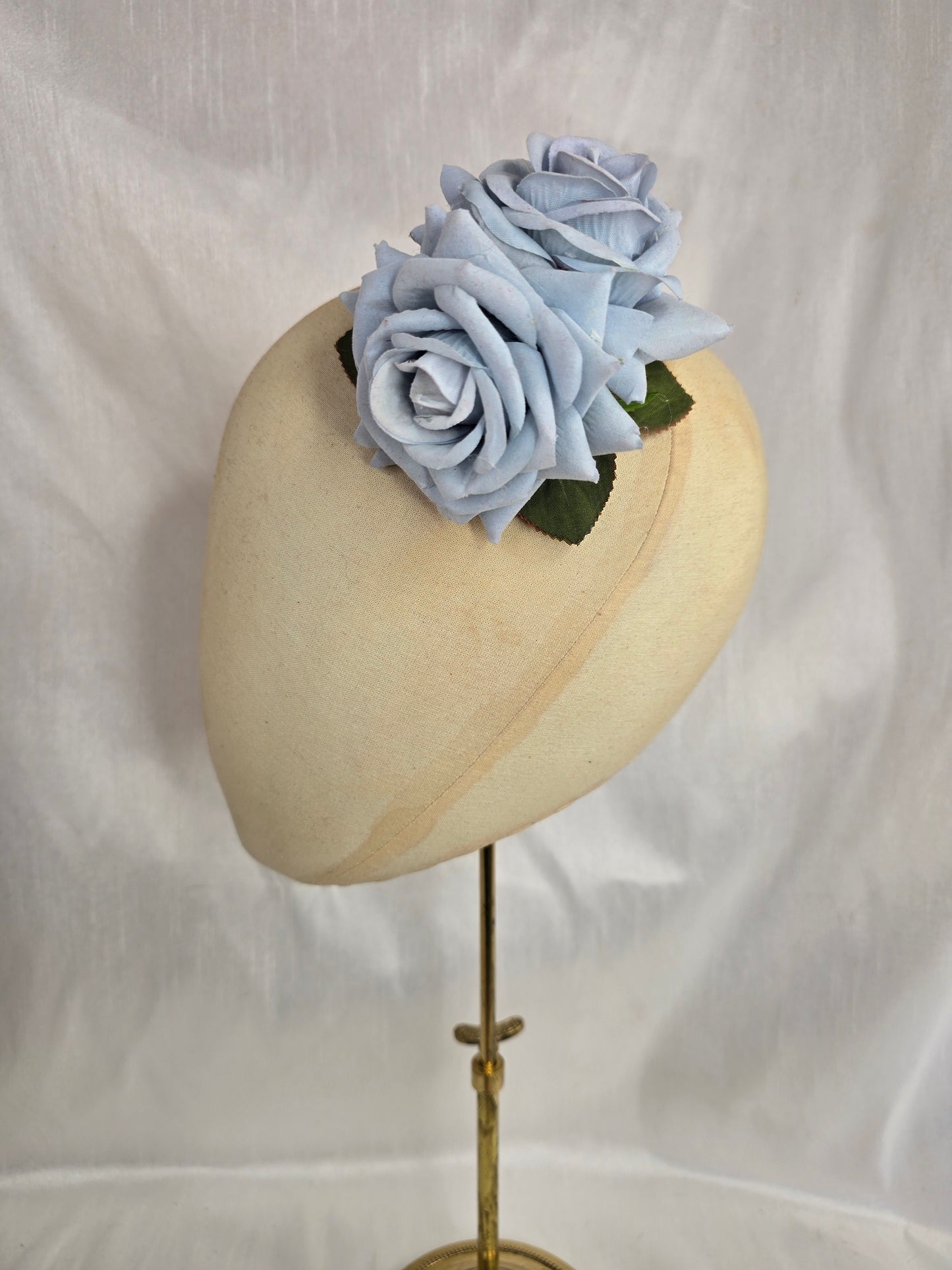 Pale blue rose hair flower