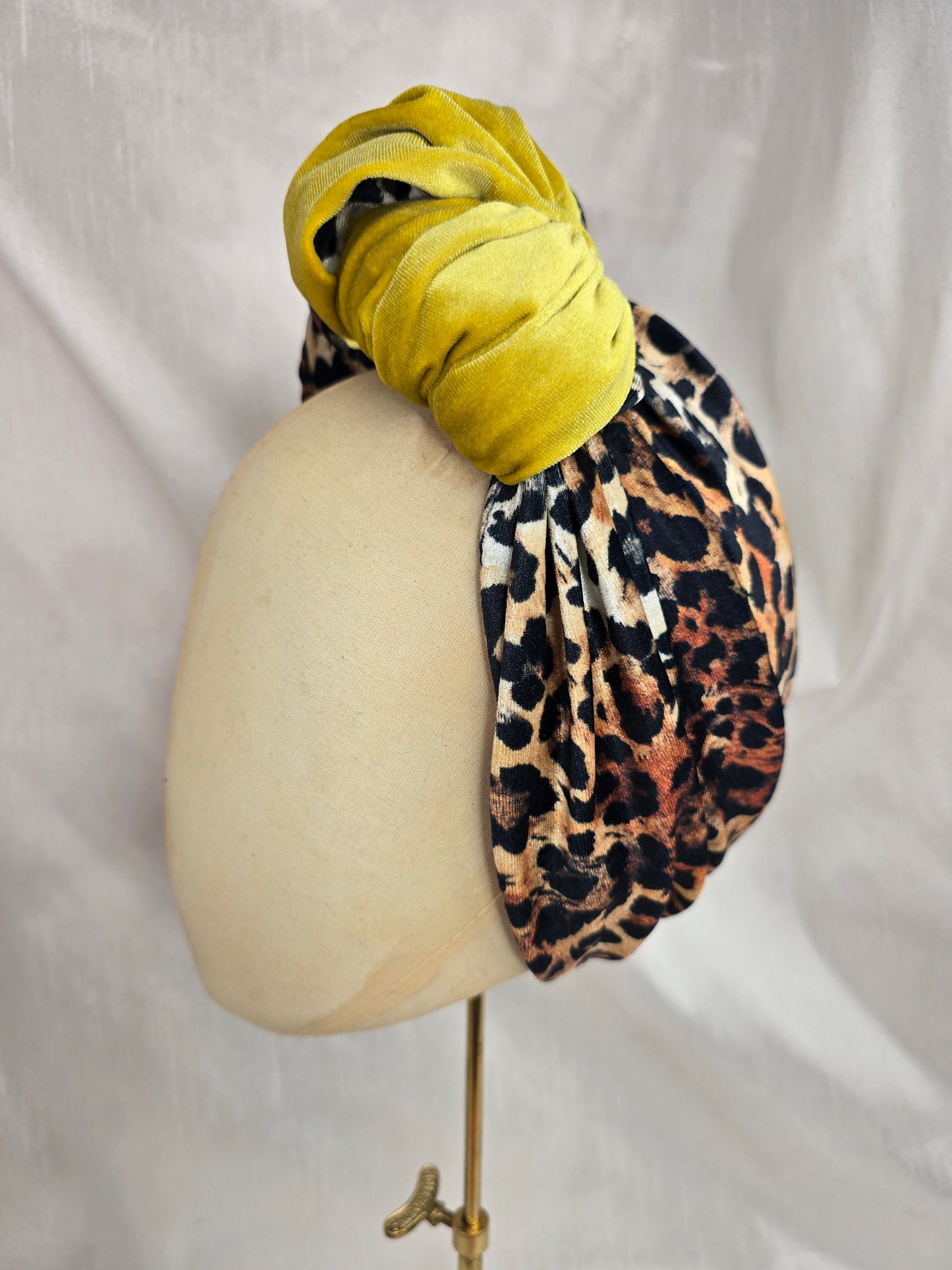 Chartruese yellow and leopard stretch velvet turban with corsage