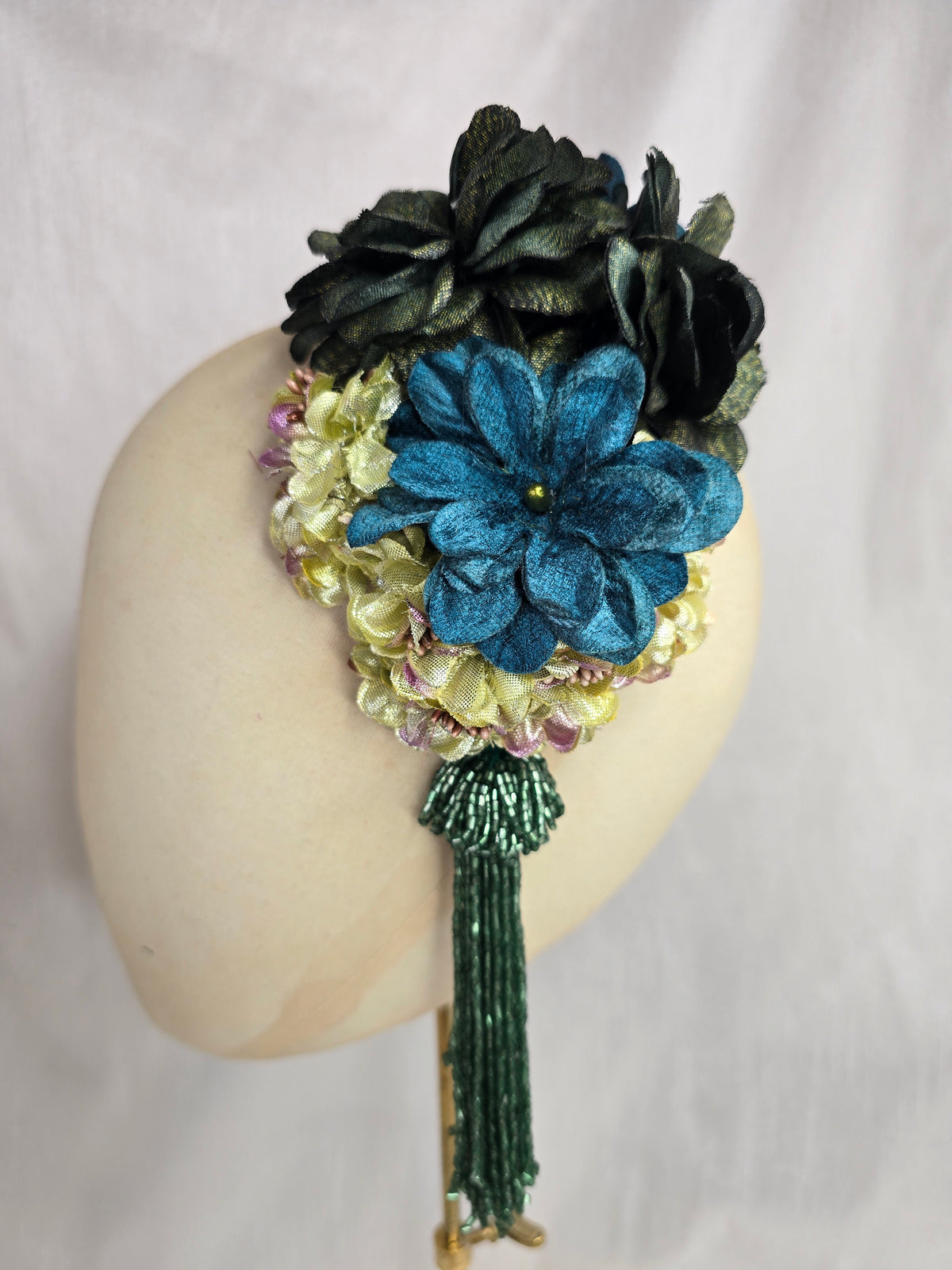 Medium teal, green, gold and chartreuse flower headpiece/corsage with beaded tassel