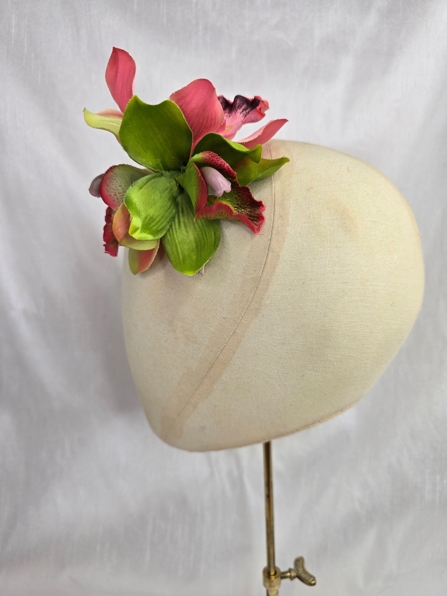 Pink and green orchid hair flower
