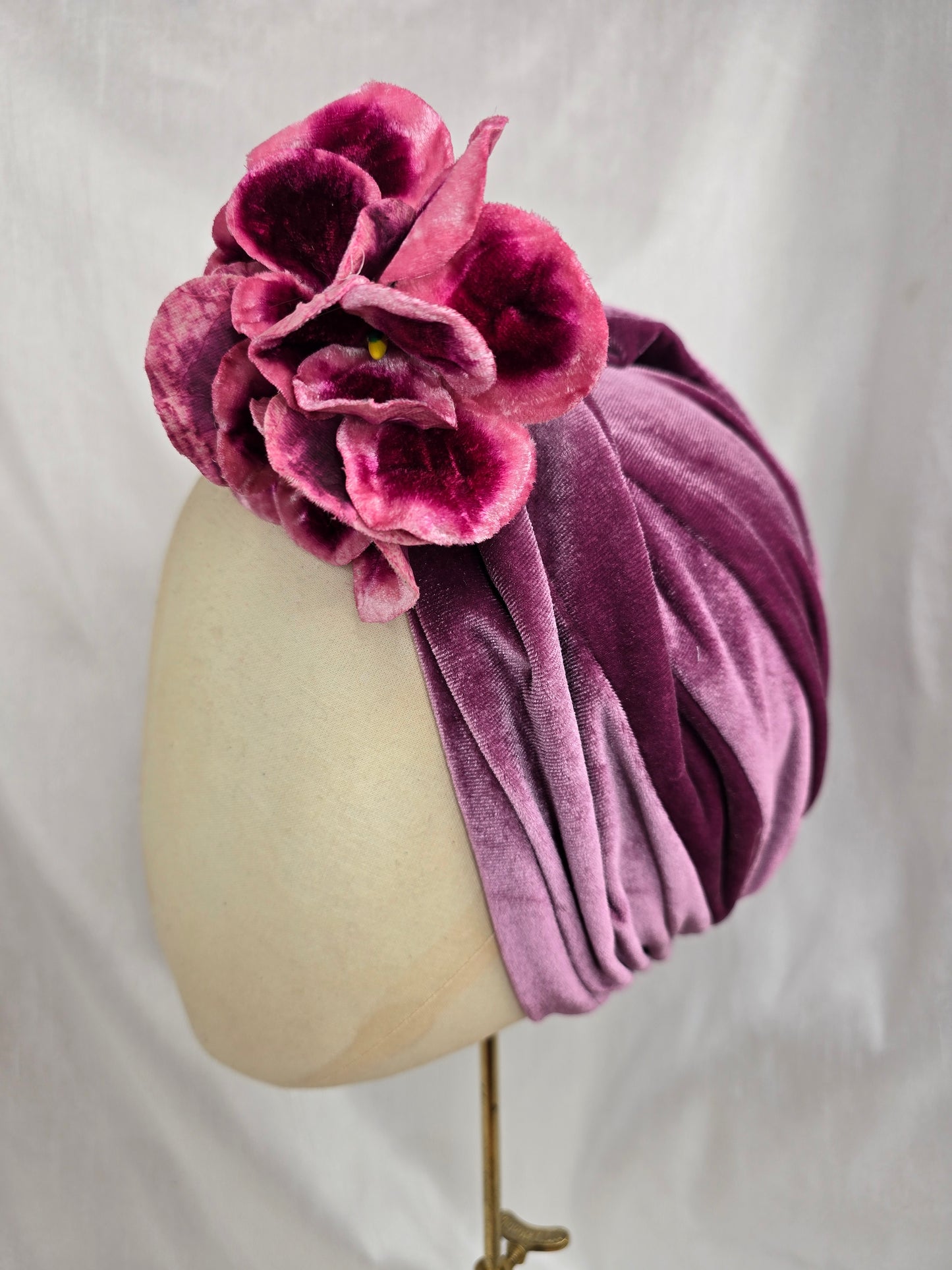 Heather purple stretch velvet turban with flower trim and corsage
