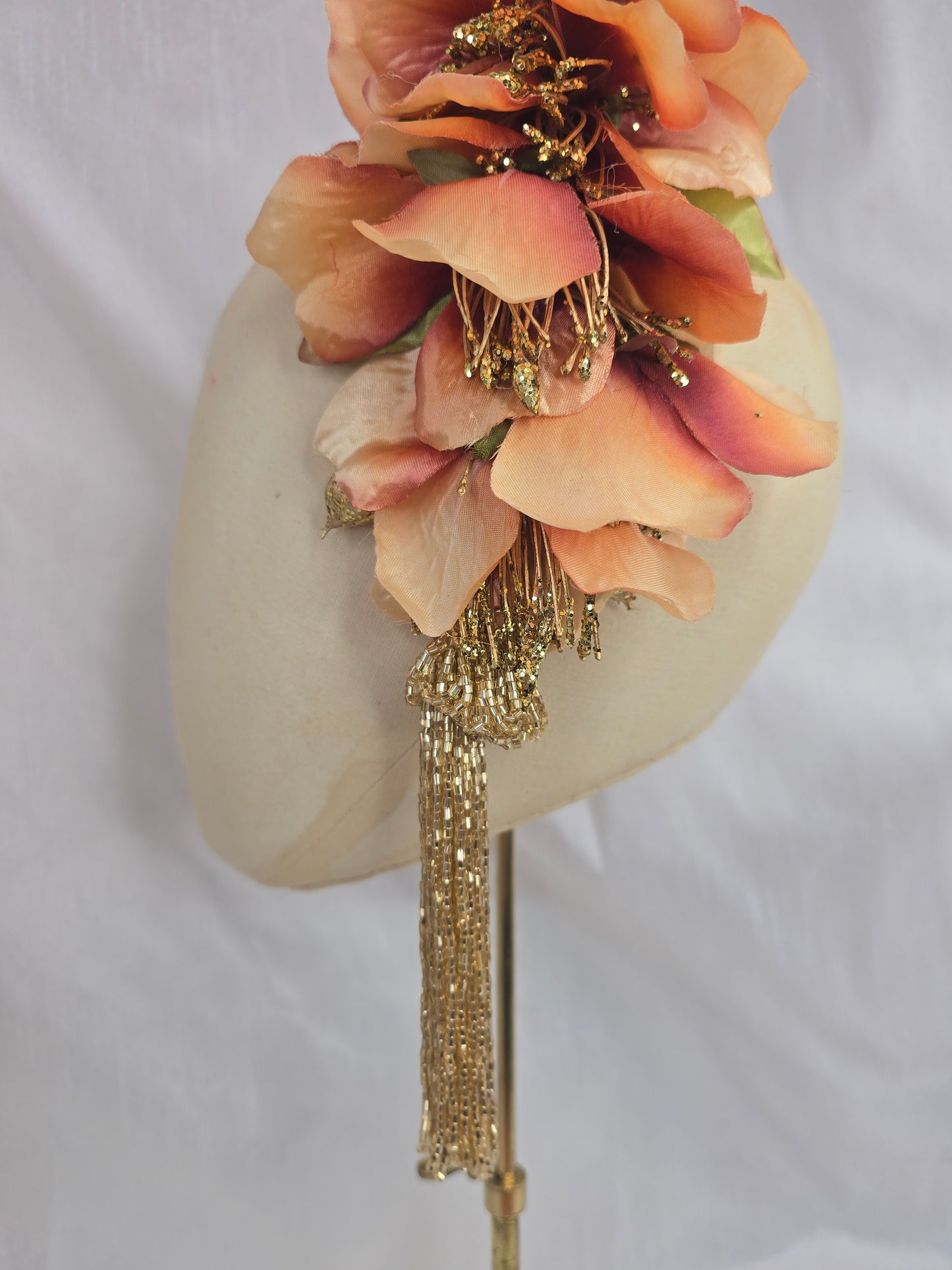 Large pale orange and gold cascade hair flower with beaded tassels