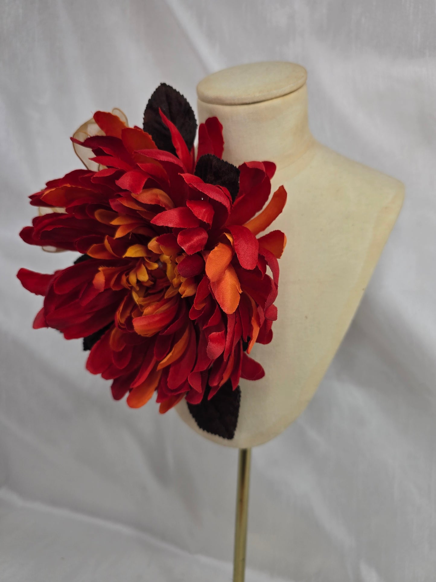 Large orange and brown chrysanthemum corsage
