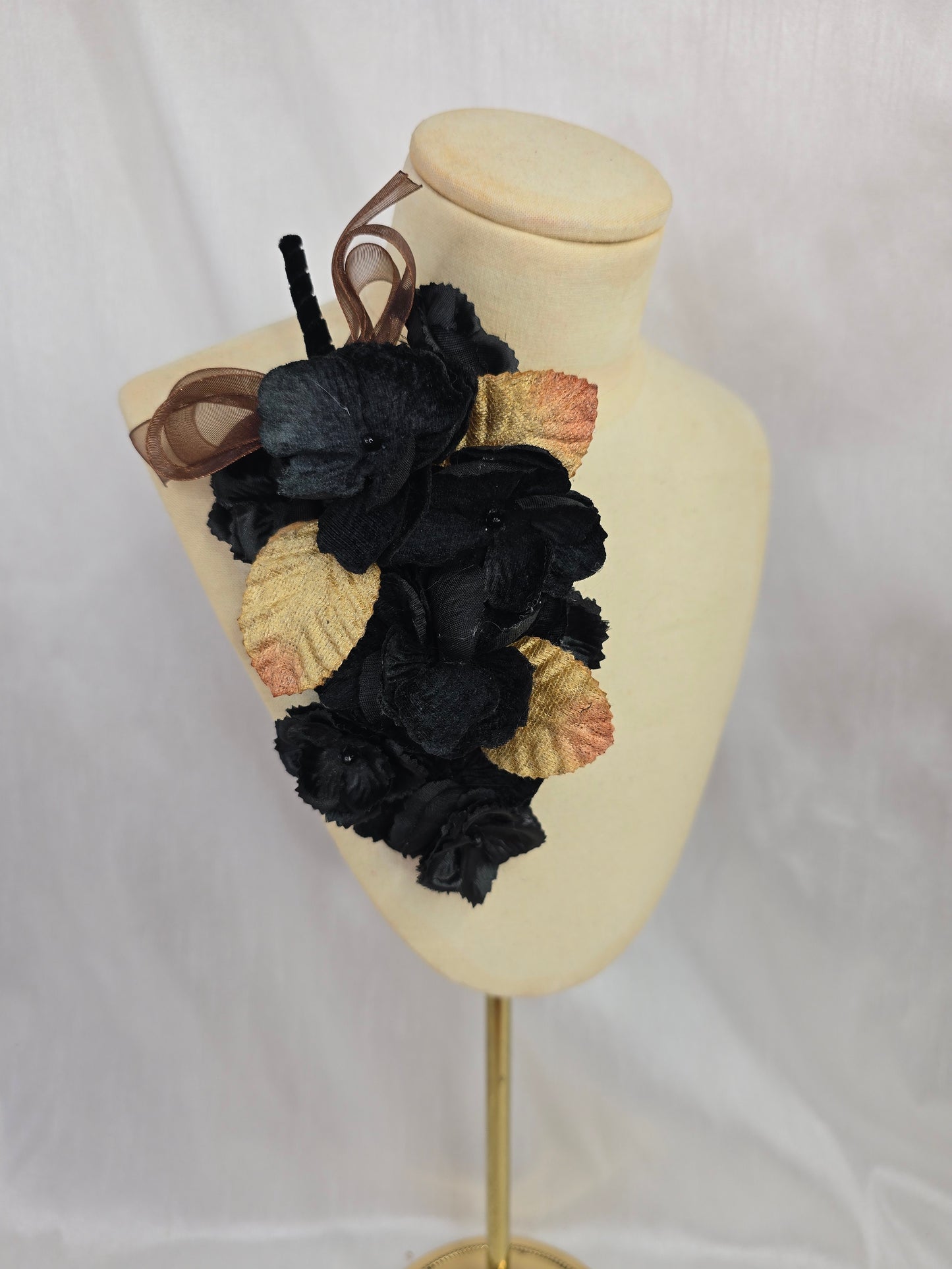 Leopard and tan stretch jersey turban with flower trim and corsage