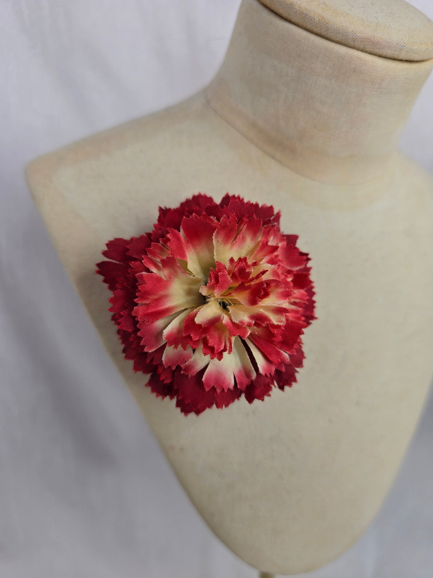 Classic mens red and pale yellow carnation buttonhole/bouttoniere