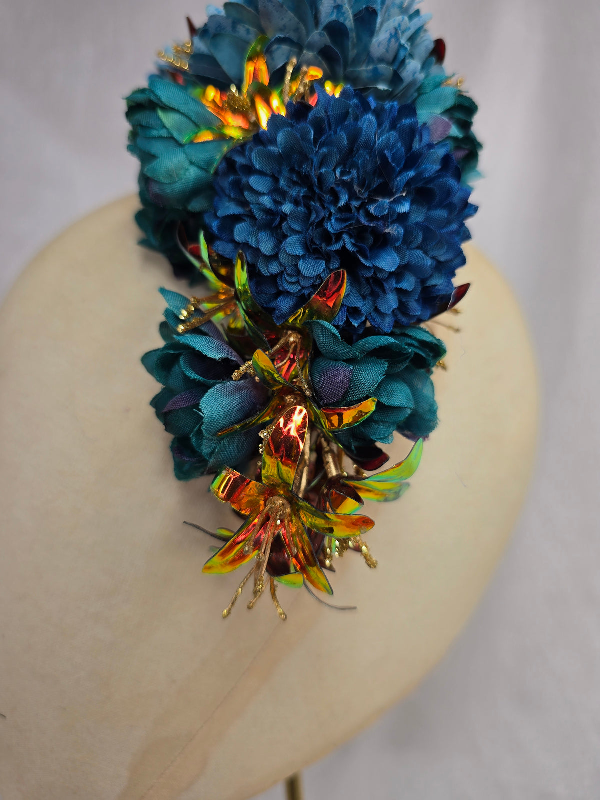 Large teal and iridescent orange large hair flower