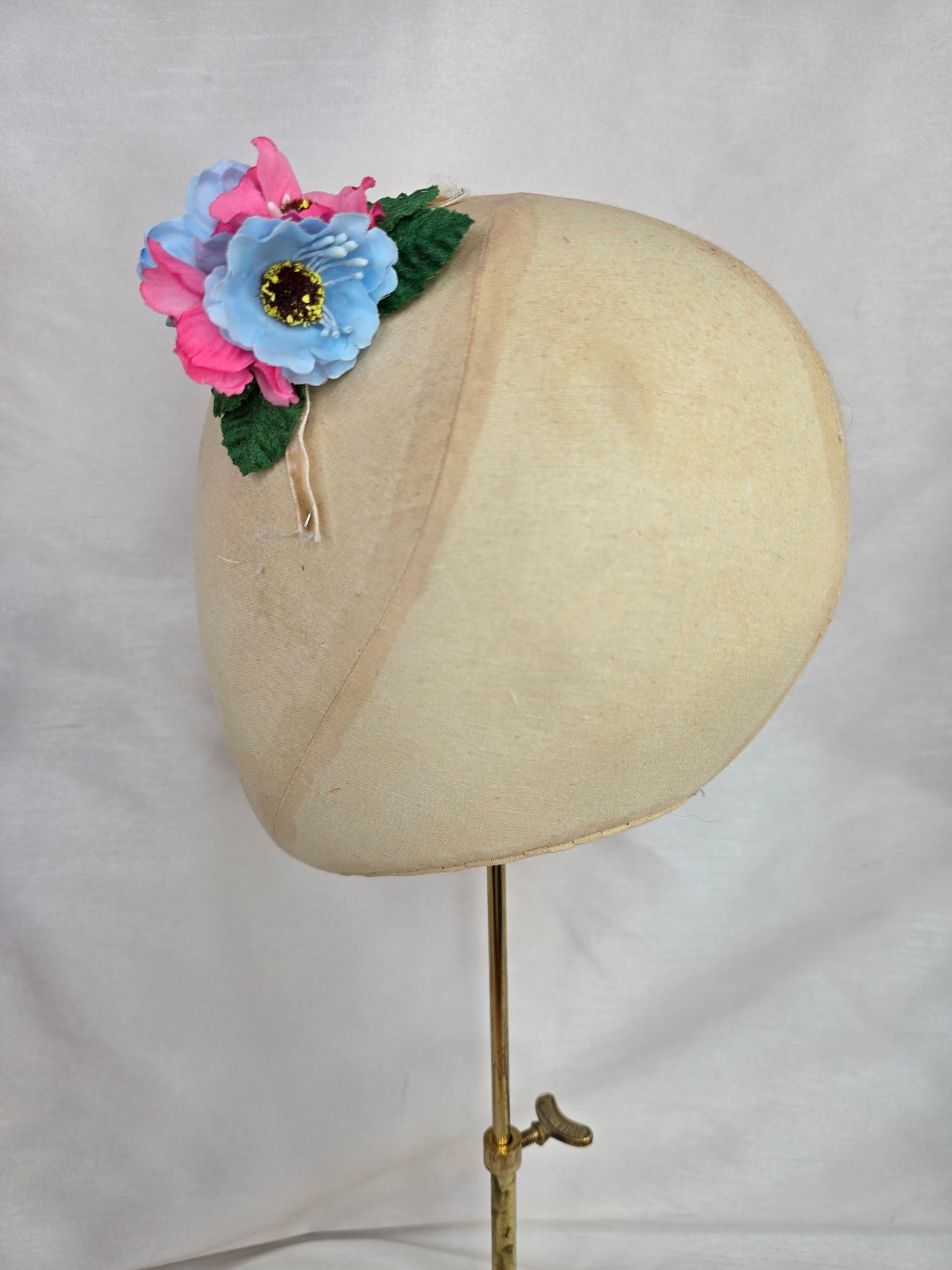 Pink and blue small hair flower