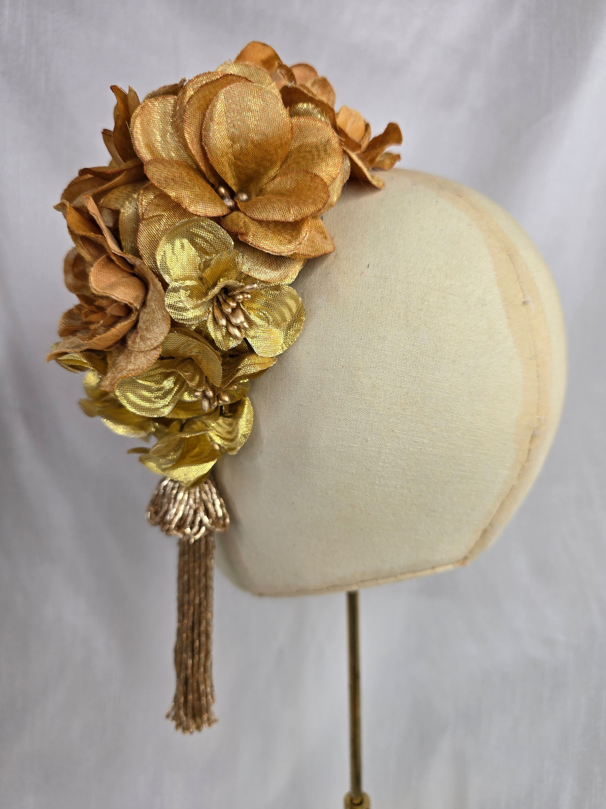 Medium autumn gold flower headpiece/corsage with beaded tassel