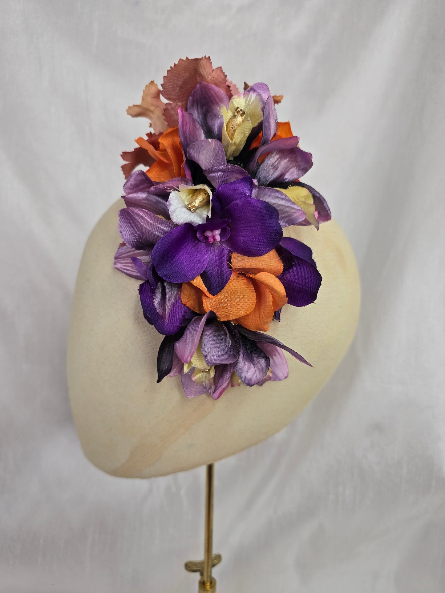 Large orange and purple orchid hair flower