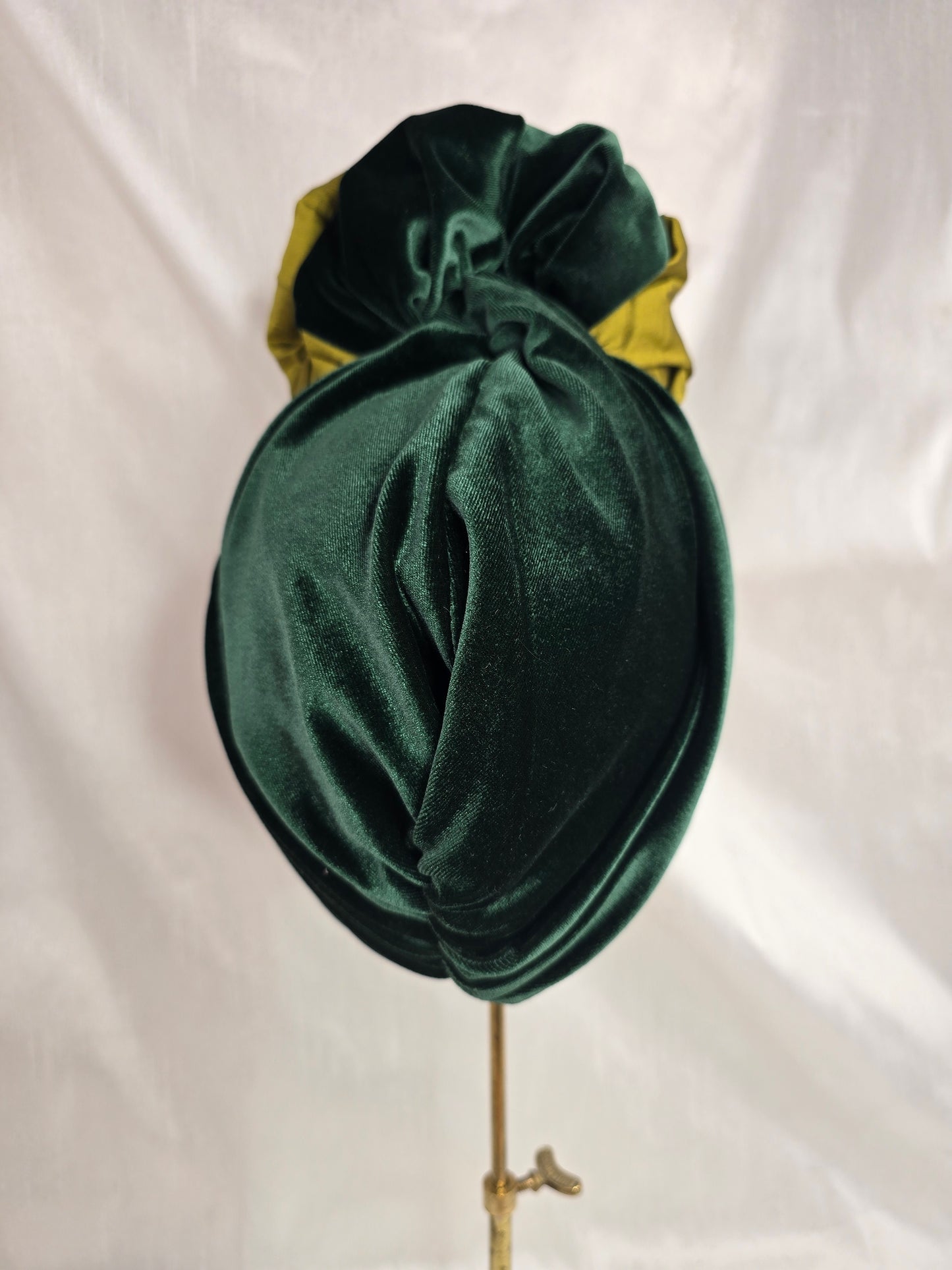 Green two tone turban with corsage