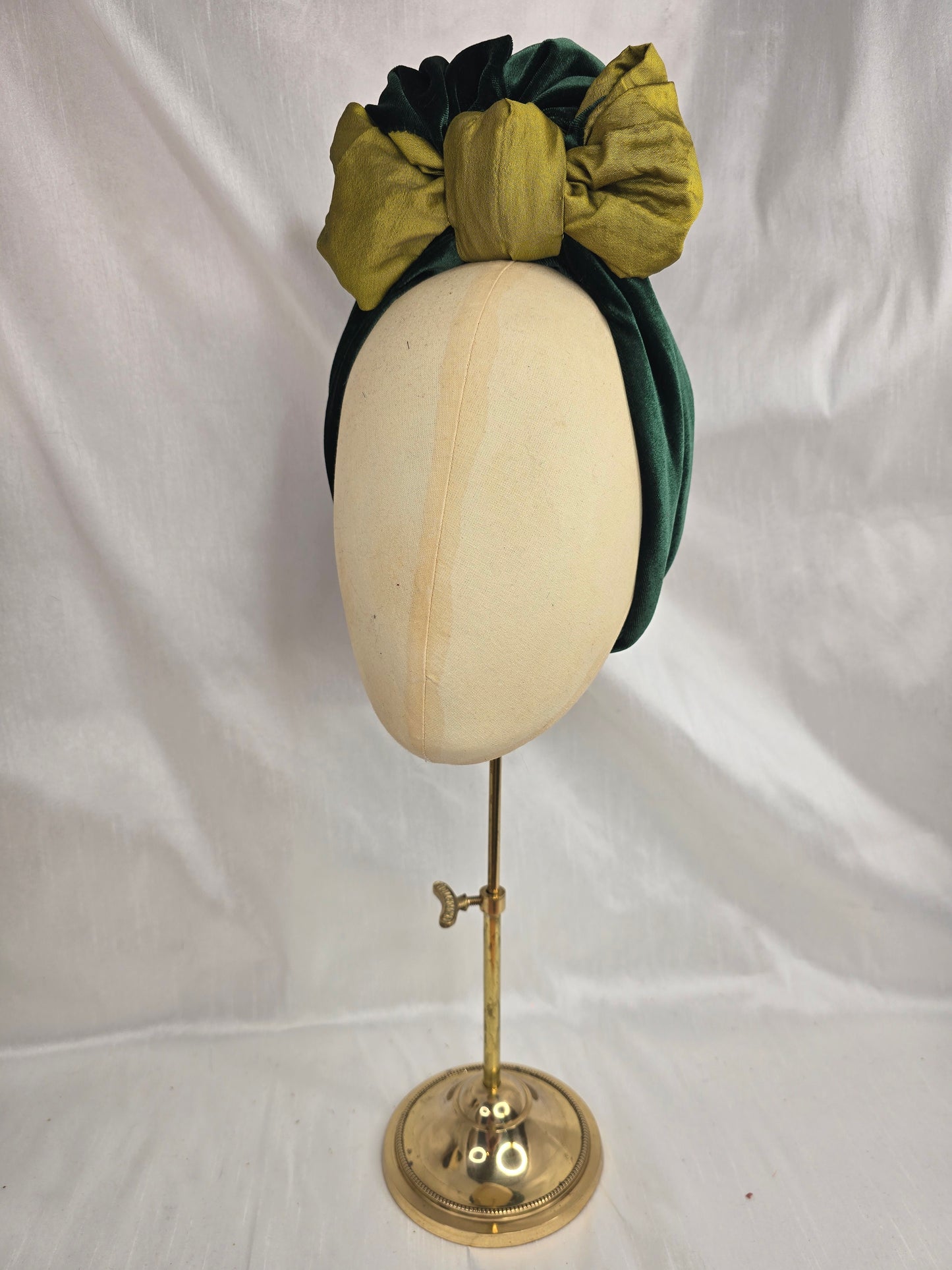Green two tone turban with corsage