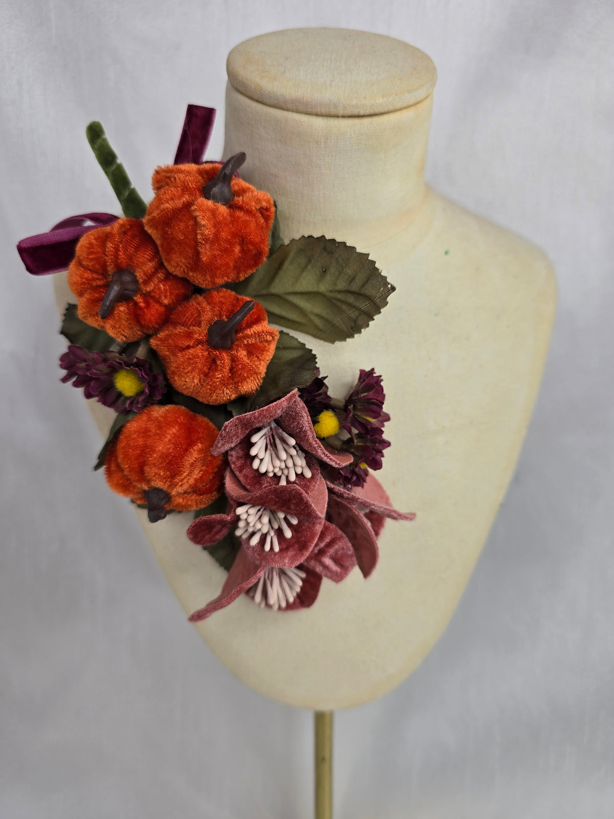 Orange, pink and teal pumpkin corsage