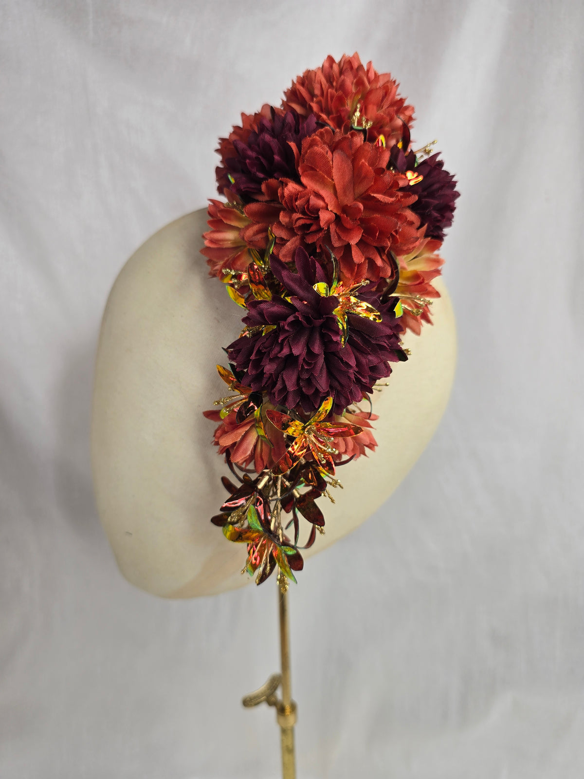 Large orange, maroon and iridescent orange large hair flower