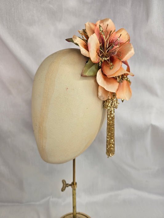Medium pale orange and gold hair flower/corsage with beaded tassel