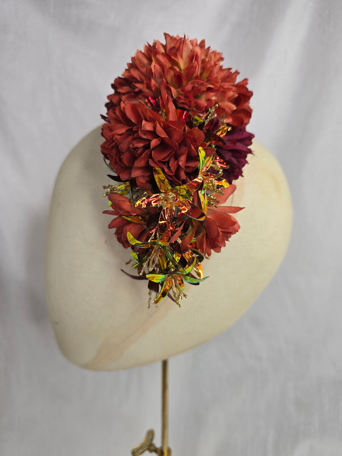 Medium orange, maroon and iridescent orange hair flower
