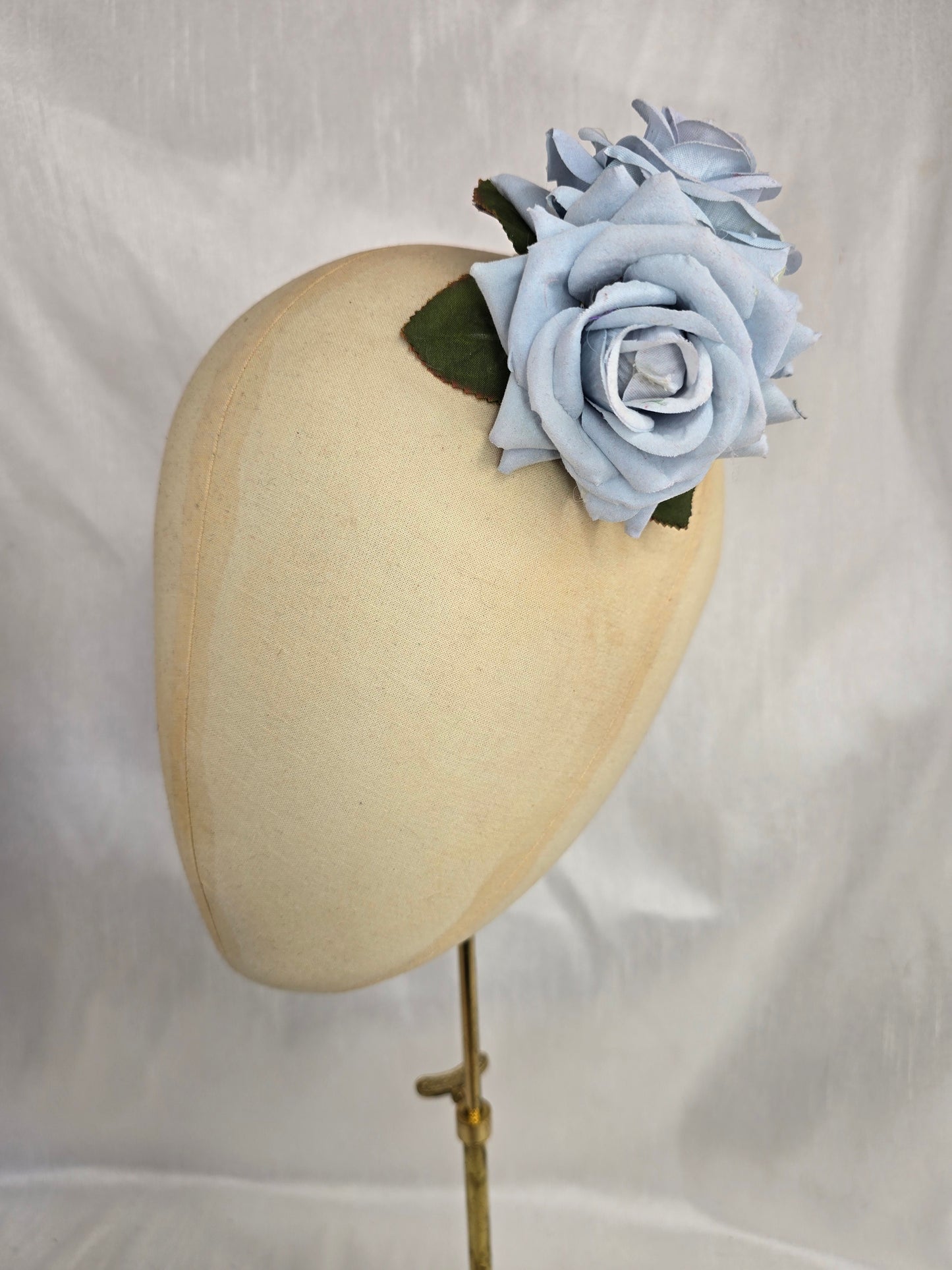 Pale blue rose hair flower