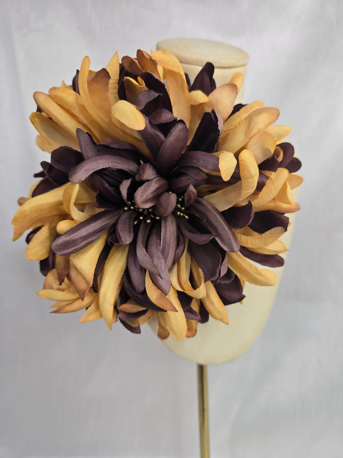 Large ochre and brown chrysanthemum corsage