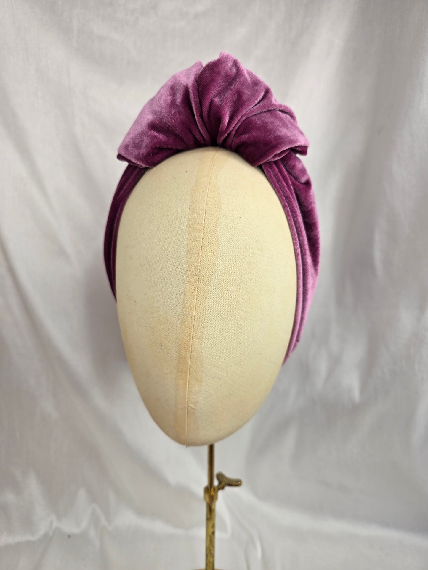 Heather purple stretch velvet turban with flower trim and corsage