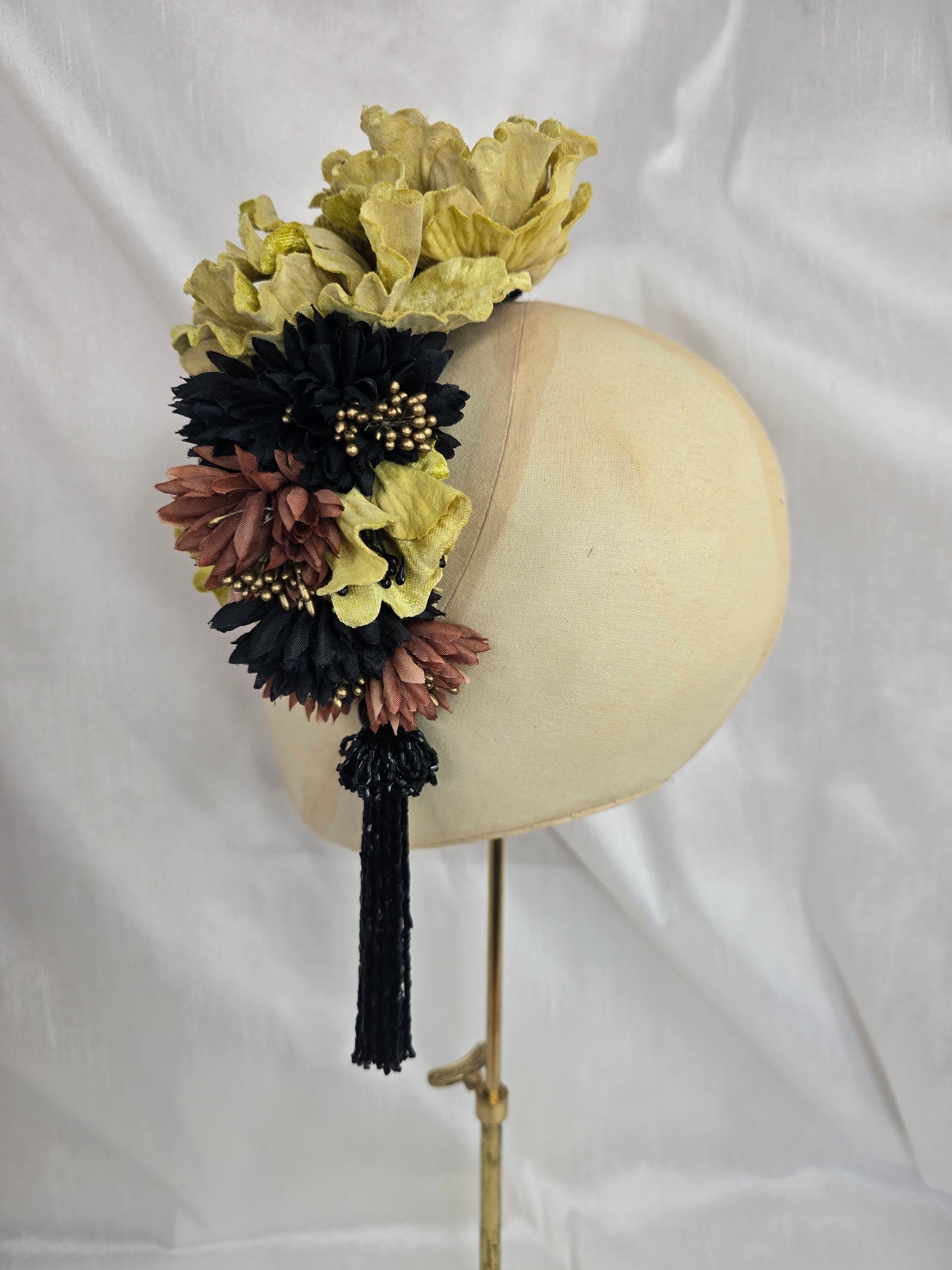 Large chartruese yellow, black and gold flower headpiece with black beaded tassel